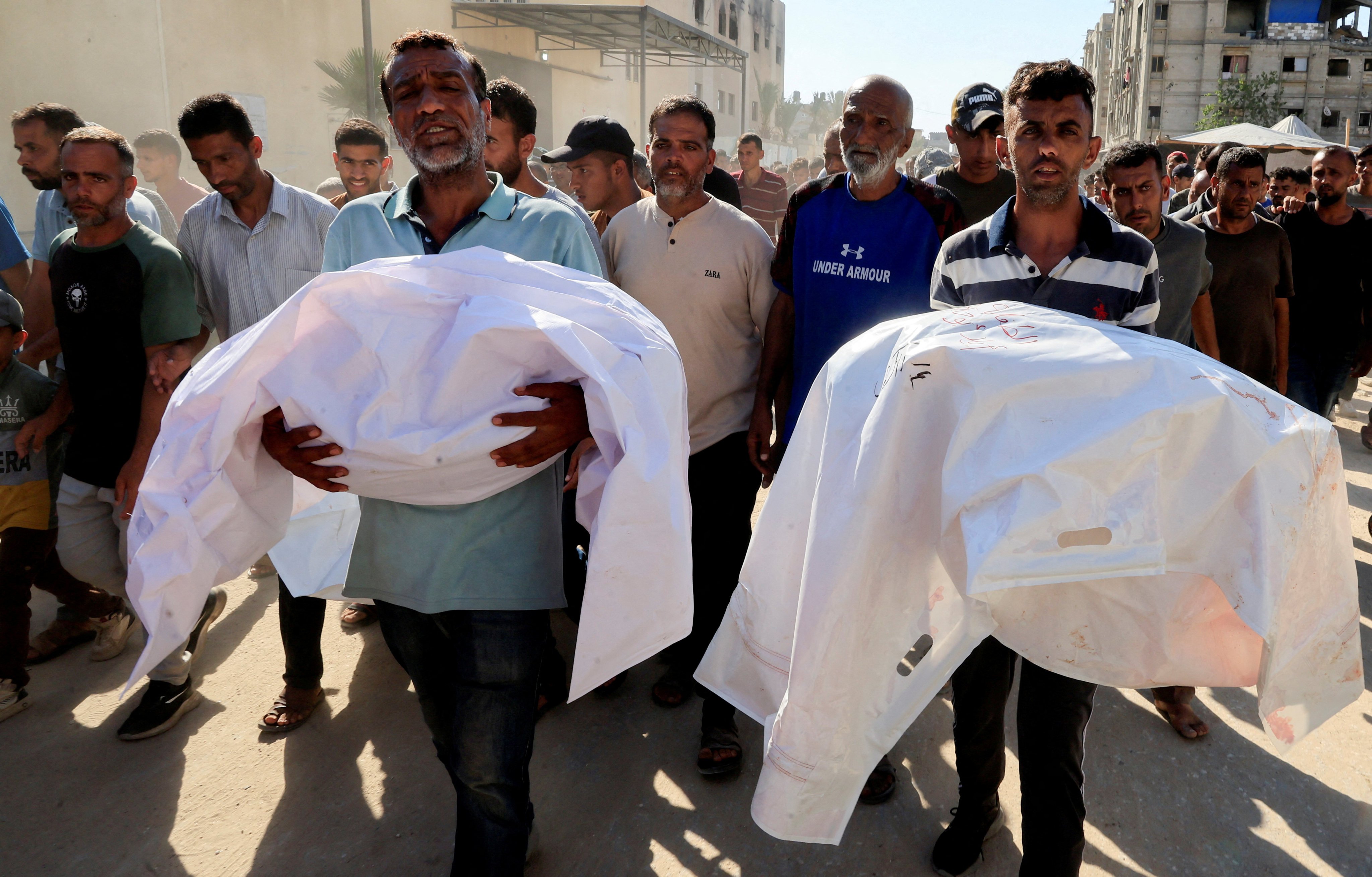 Mourners carry the bodies on Thursday of Palestinians who Gaza’s health ministry say were killed in an Israeli strike on a tent. Photo: Reuters