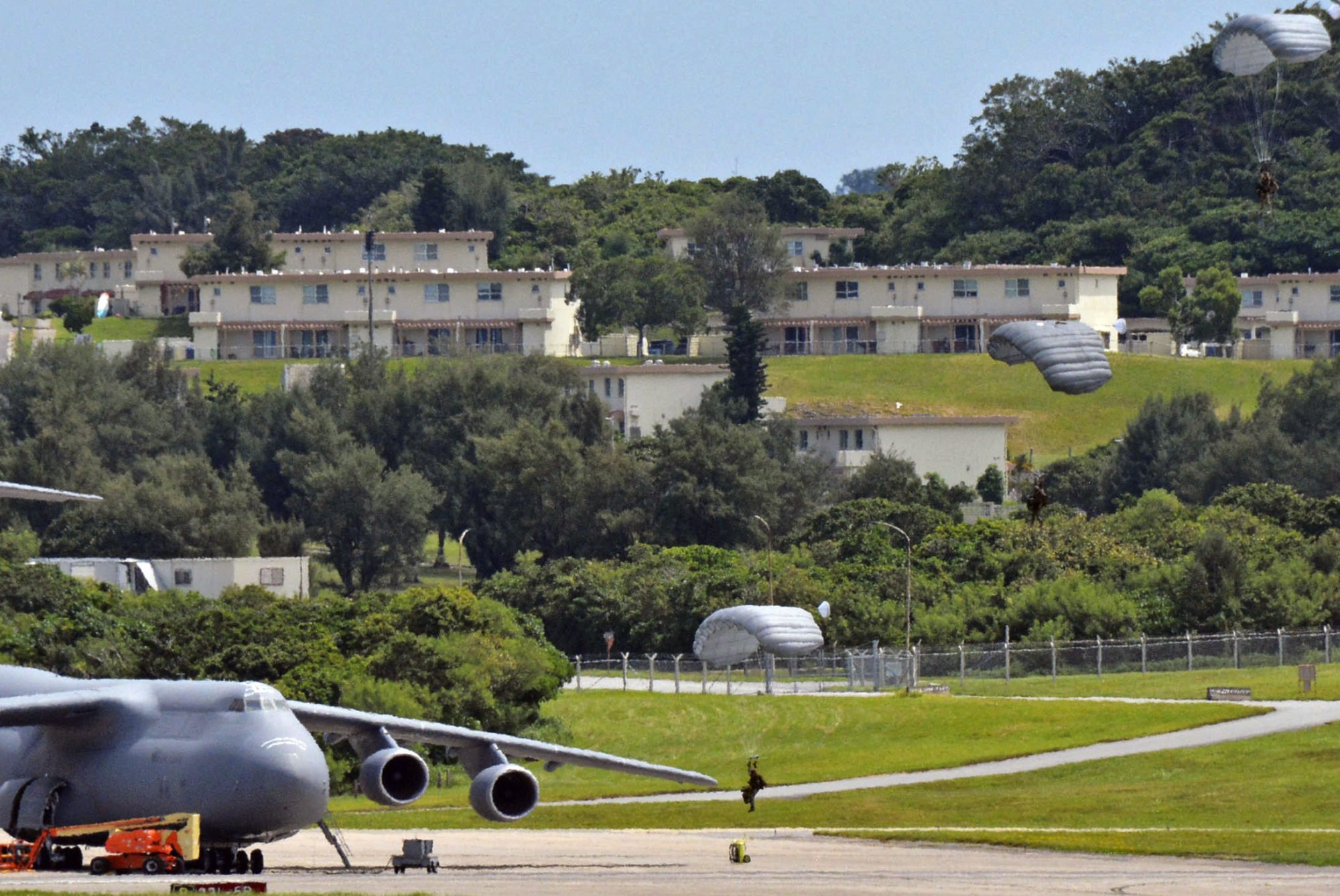 US Air Force personnel conduct a parachuting drill at Kadena Air Base in the southern Japan island prefecture of Okinawa. Photo: Kyodo US Air Force personnel conduct a parachuting drill at Kadena Air Base in the southern Japan island prefecture of Okinawa. Photo: Kyodo