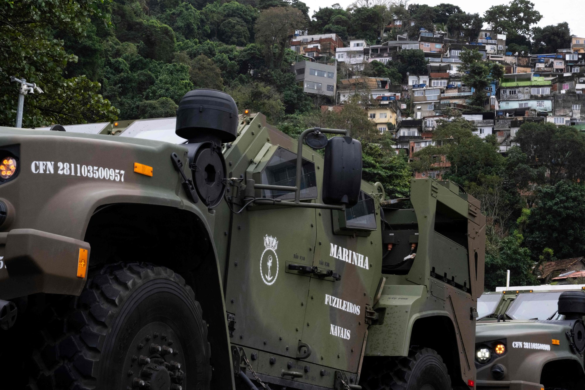 Brazilian navy armoured vehicles are seen near the Rocinha favela as part of a security deployment for the upcoming Brics summit in Rio de Janeiro, Brazil, on Thursday. Photo: AFP Brazilian navy armoured vehicles are seen near the Rocinha favela as part of a security deployment for the upcoming Brics summit in Rio de Janeiro, Brazil, on Thursday. Photo: AFP