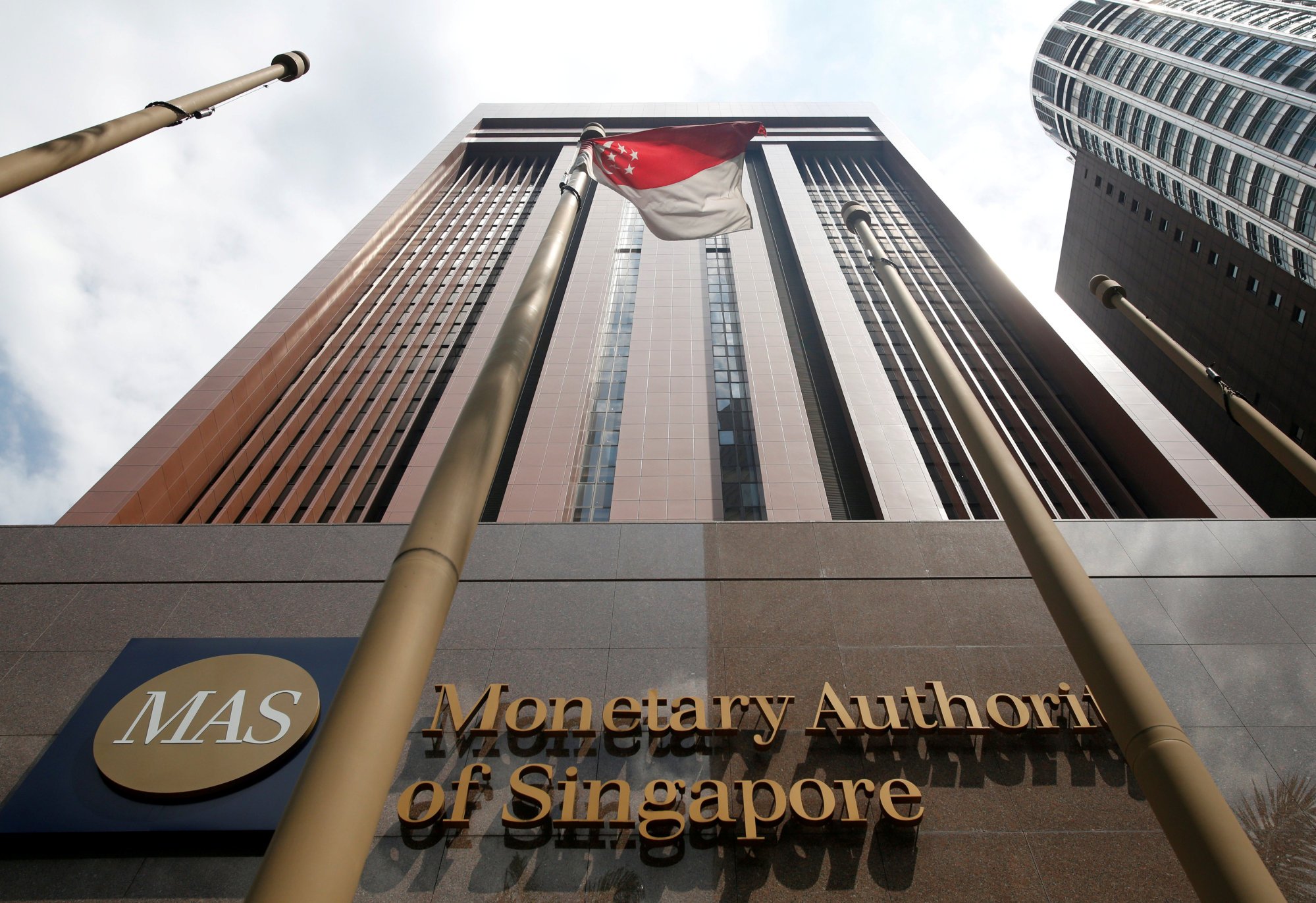 The Monetary Authority of Singapore has fined nine financial institutions a total of US$21.55 million over a US$2.36 billion money-laundering case. Photo: Reuters The Monetary Authority of Singapore has fined nine financial institutions a total of US$21.55 million over a US$2.36 billion money-laundering case. Photo: Reuters