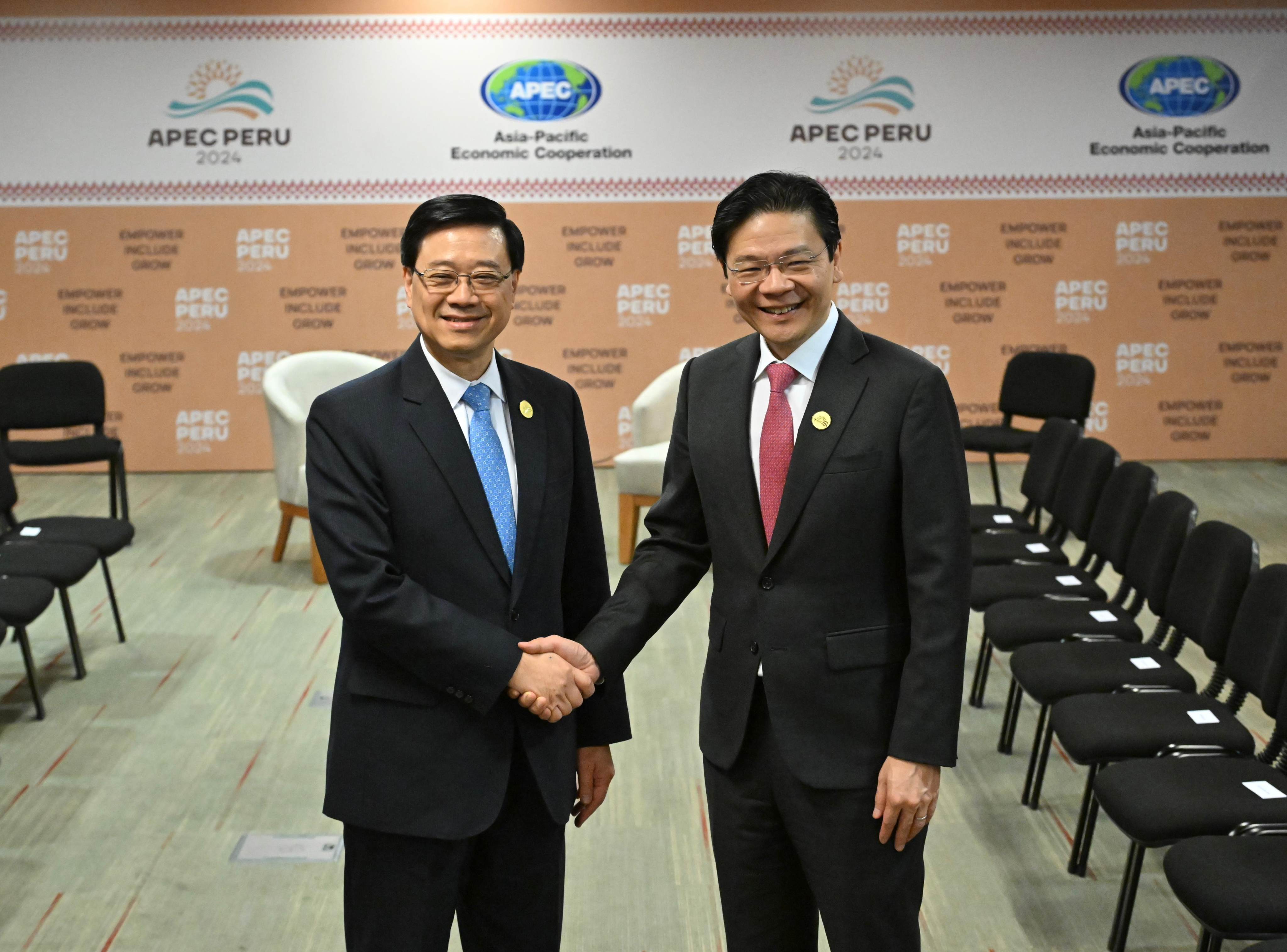 Hong Kong Chief Executive John Lee Ka-chiu and Singapore Prime Minister Lawrence Wong attend the Asia-Pacific Economic Cooperation (Apec) forum in Lima, Peru, on November 15, 2024. Photo: Handout
