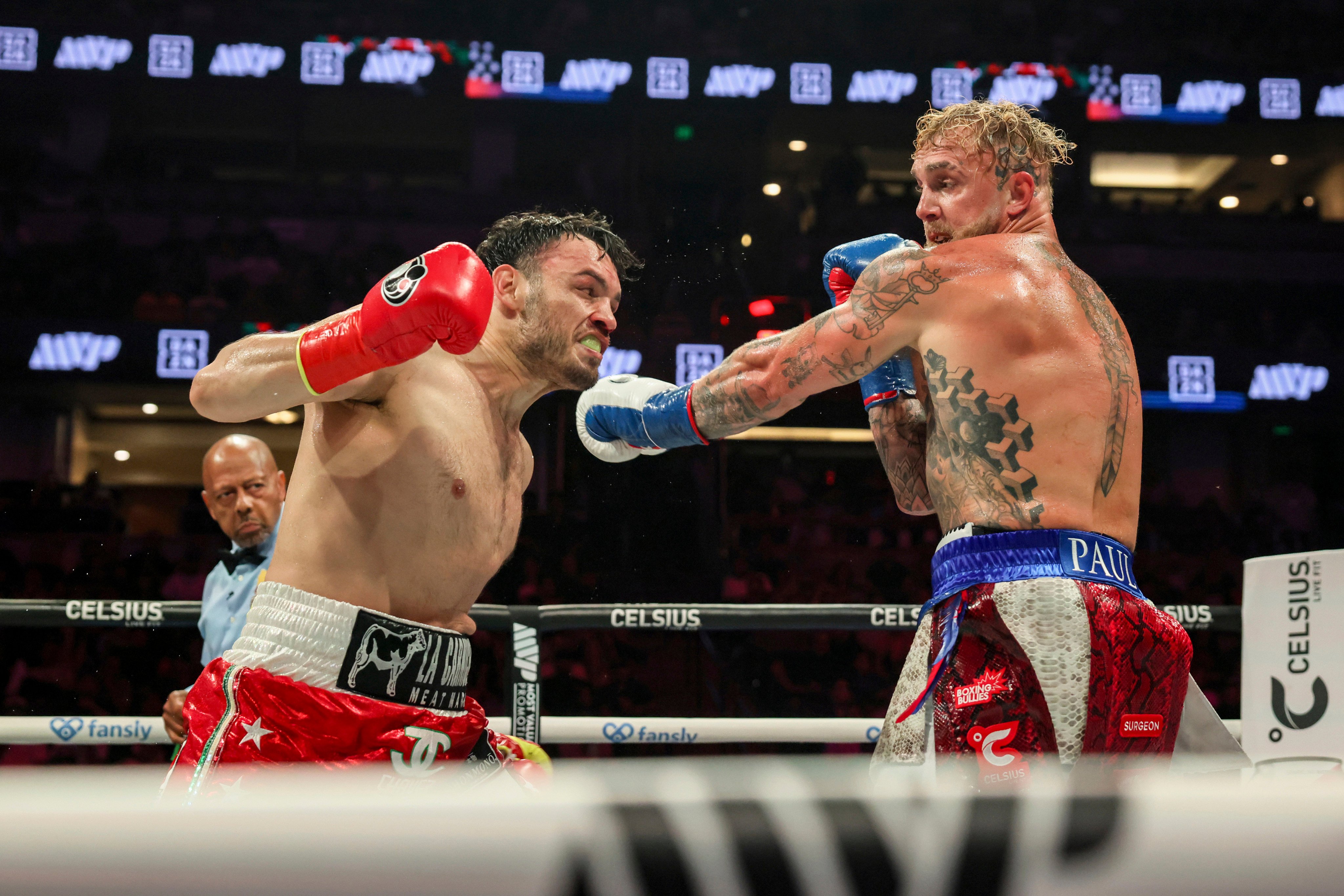 Julio Cesar Chavez Jnr (left) throws a punch at Jake Paul during their cruiserweight boxing match in Anaheim, California, in June. Photo: AP