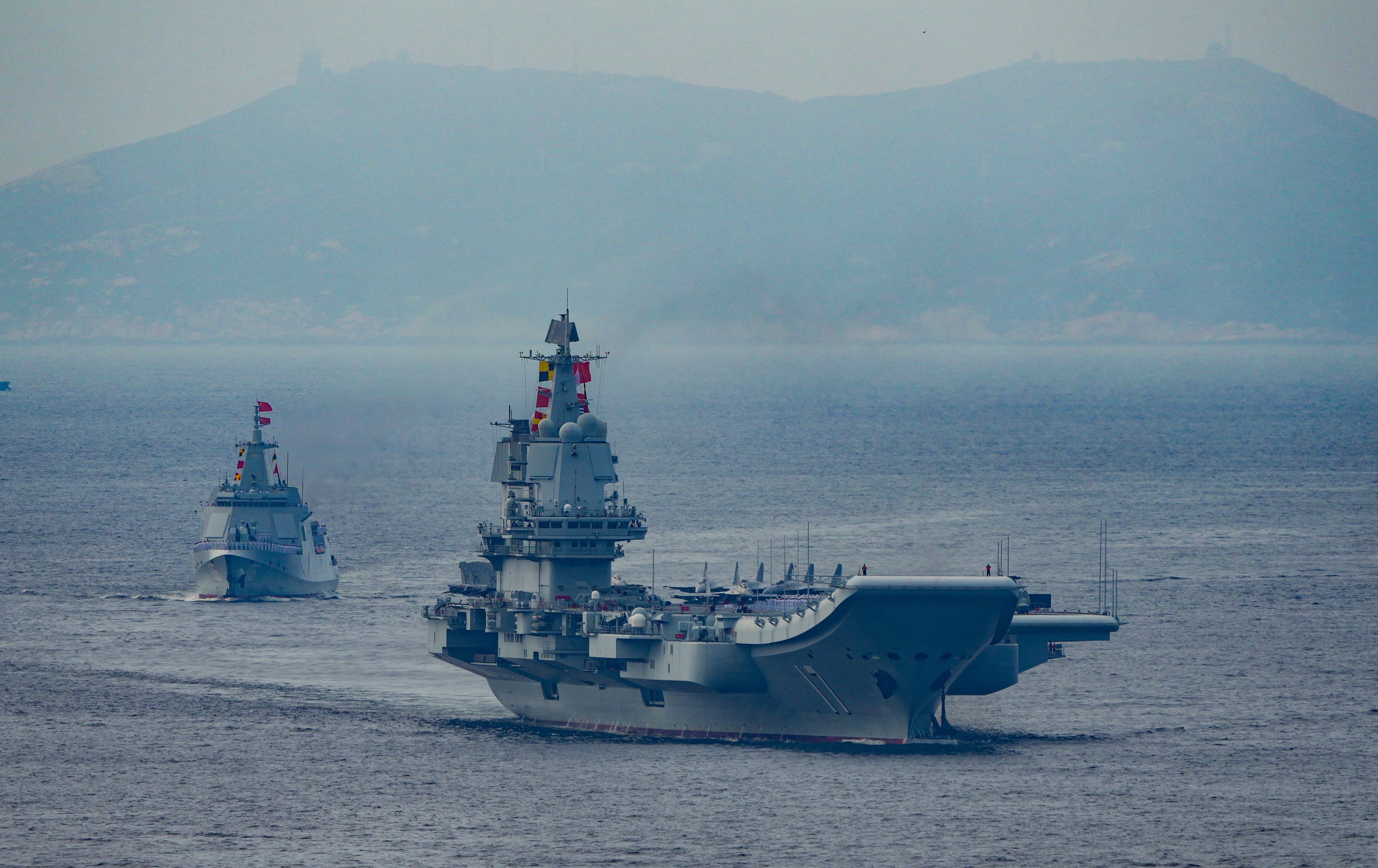 The aircraft carrier Shandong and its accompanying strike group enter Hong Kong waters as part of a five-day trip. Photo: Sam Tsang