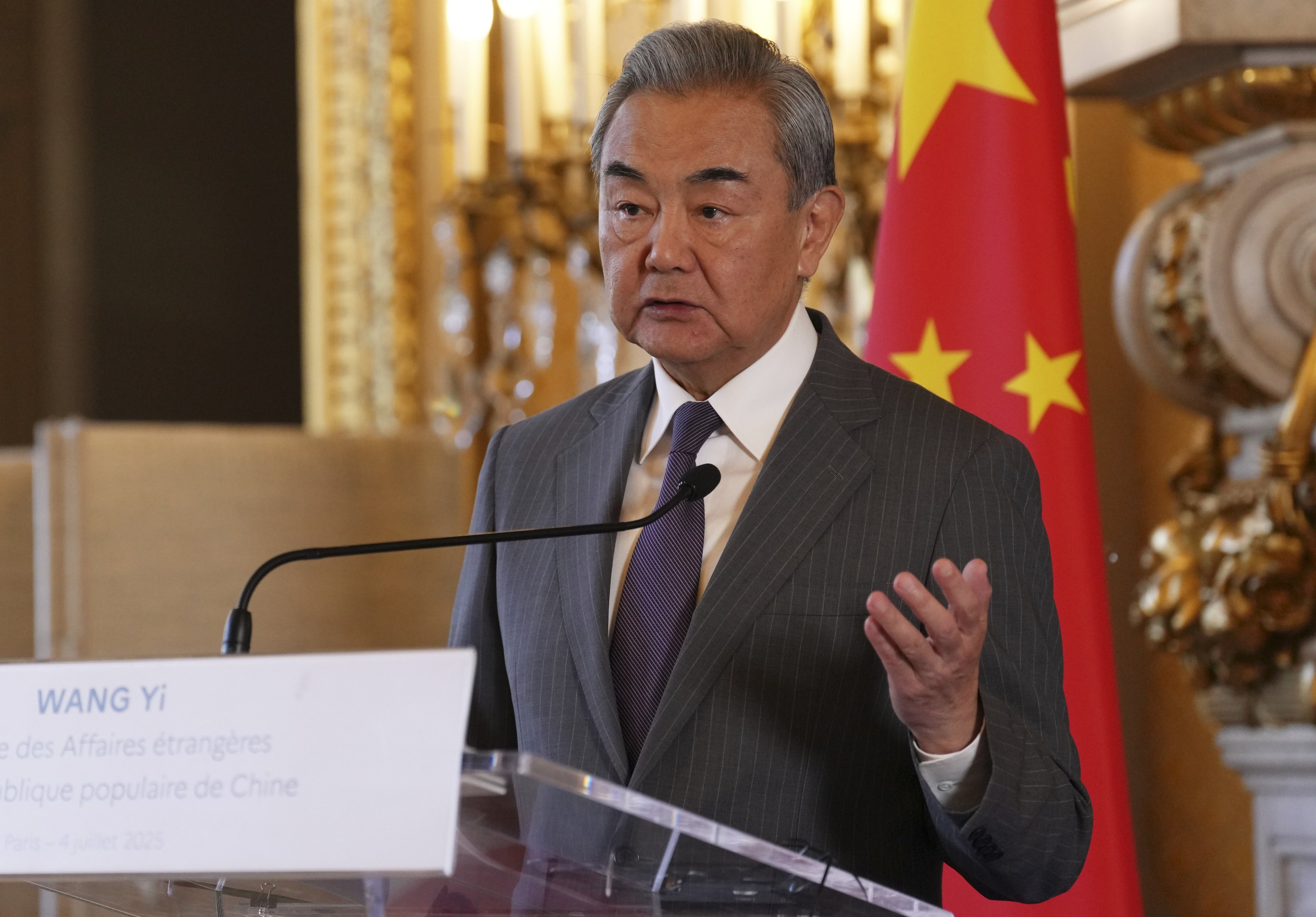 Chinese Foreign Minister Wang Yi, who is currently on a European tour, addresses journalists in Paris, France on Friday. Photo: EPA