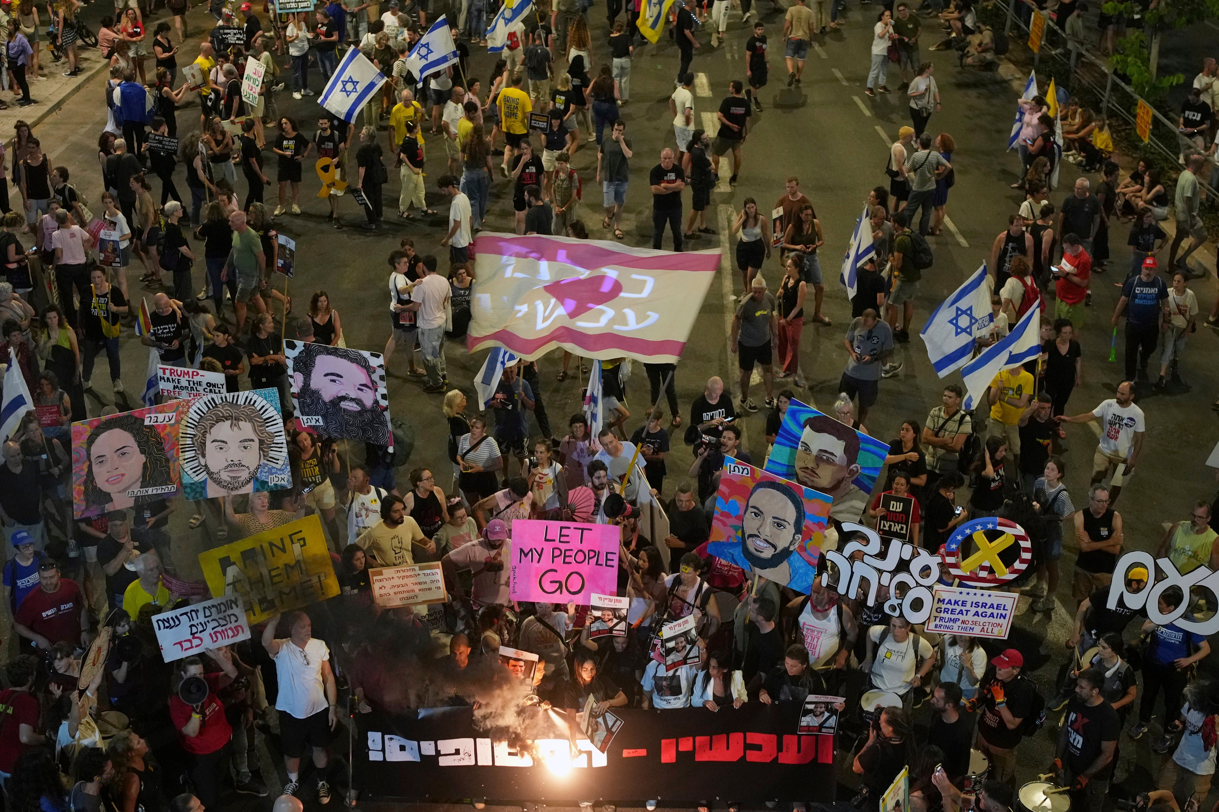Protesters demand the end of the war and immediate release of hostages held by Hamas during a rally in Tel Aviv, Israel, on Saturday. Photo: AP