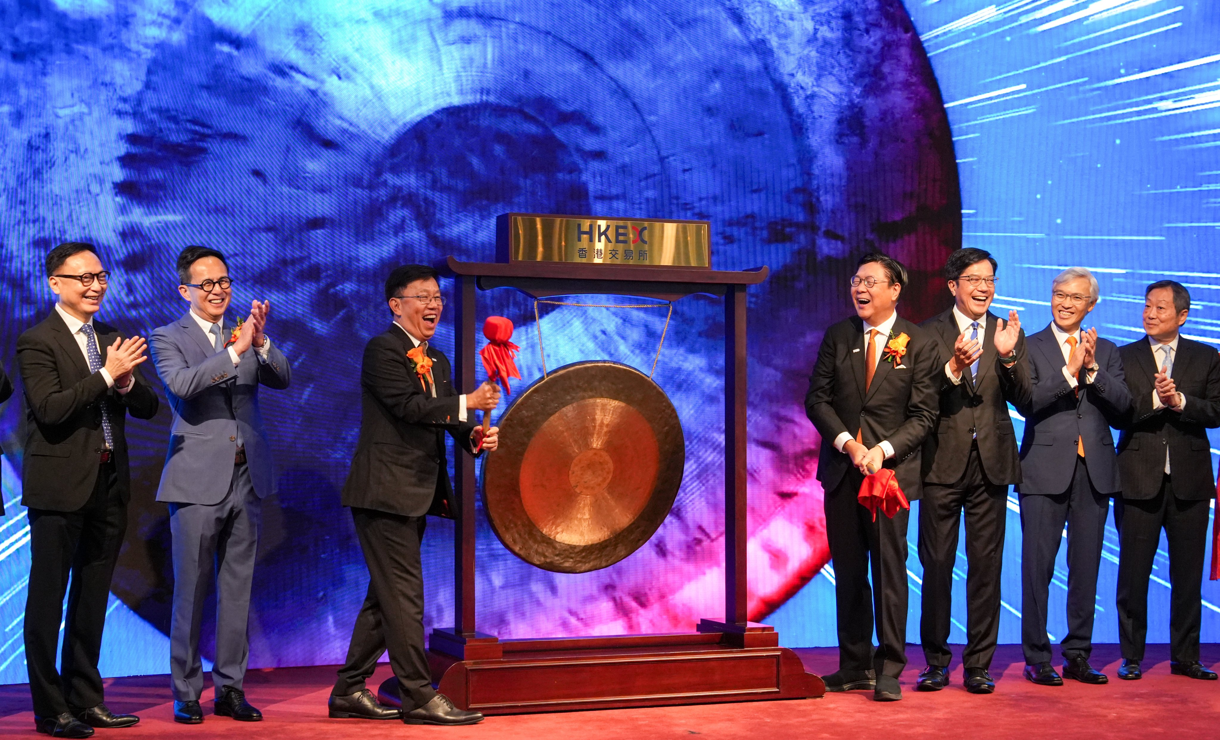 FWD Group’s chairman Fred Ma (4th right), founder Richard Li (2nd left) and CEO Huynh Thanh Phong (3rd left), during the insurer’s trading debut on the Hong Kong stock exchange on July 7, 2025. Photo: Sun Yeung