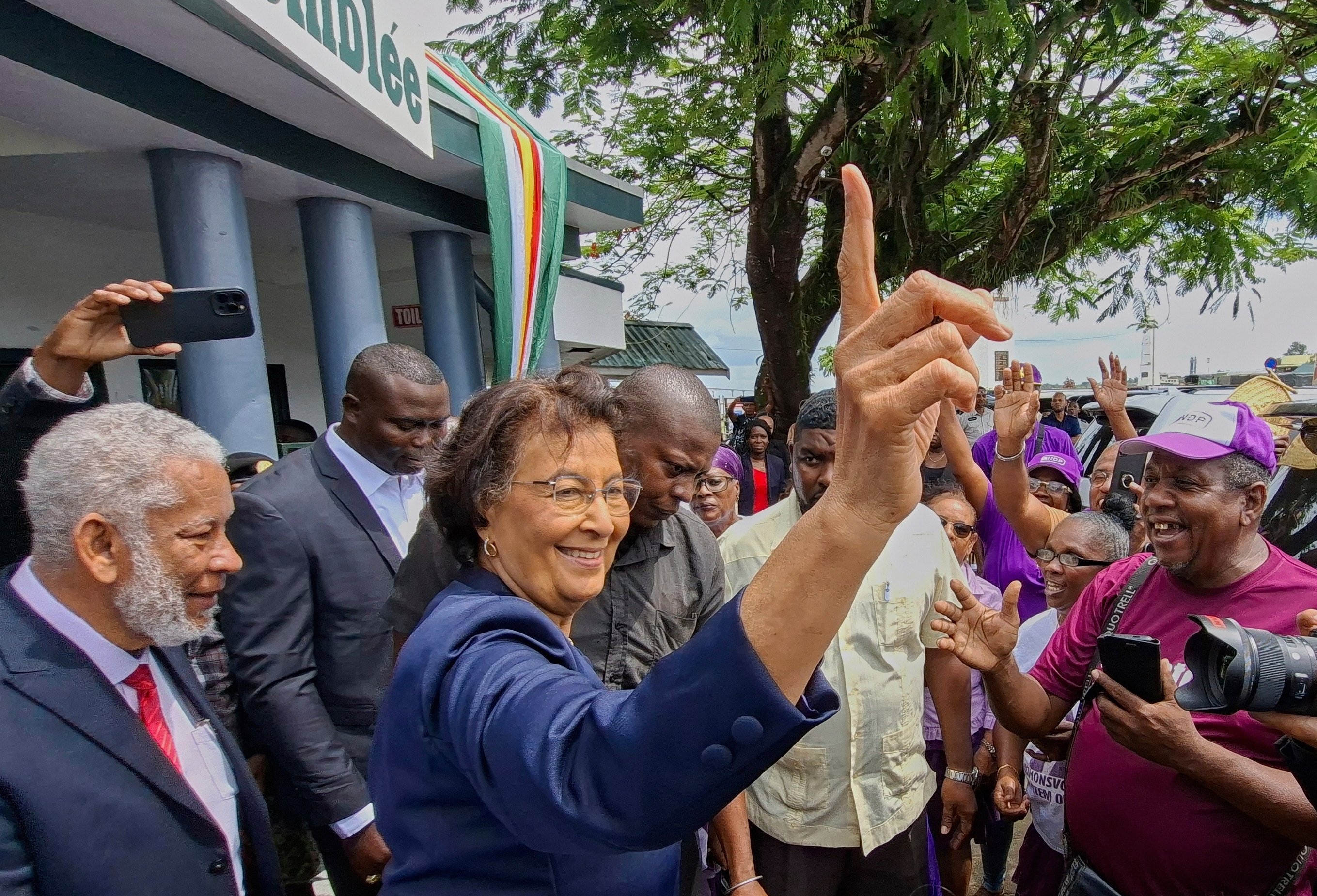 Jennifer Simons greeting people after the county’s parliament appointed her president. Photo: AP