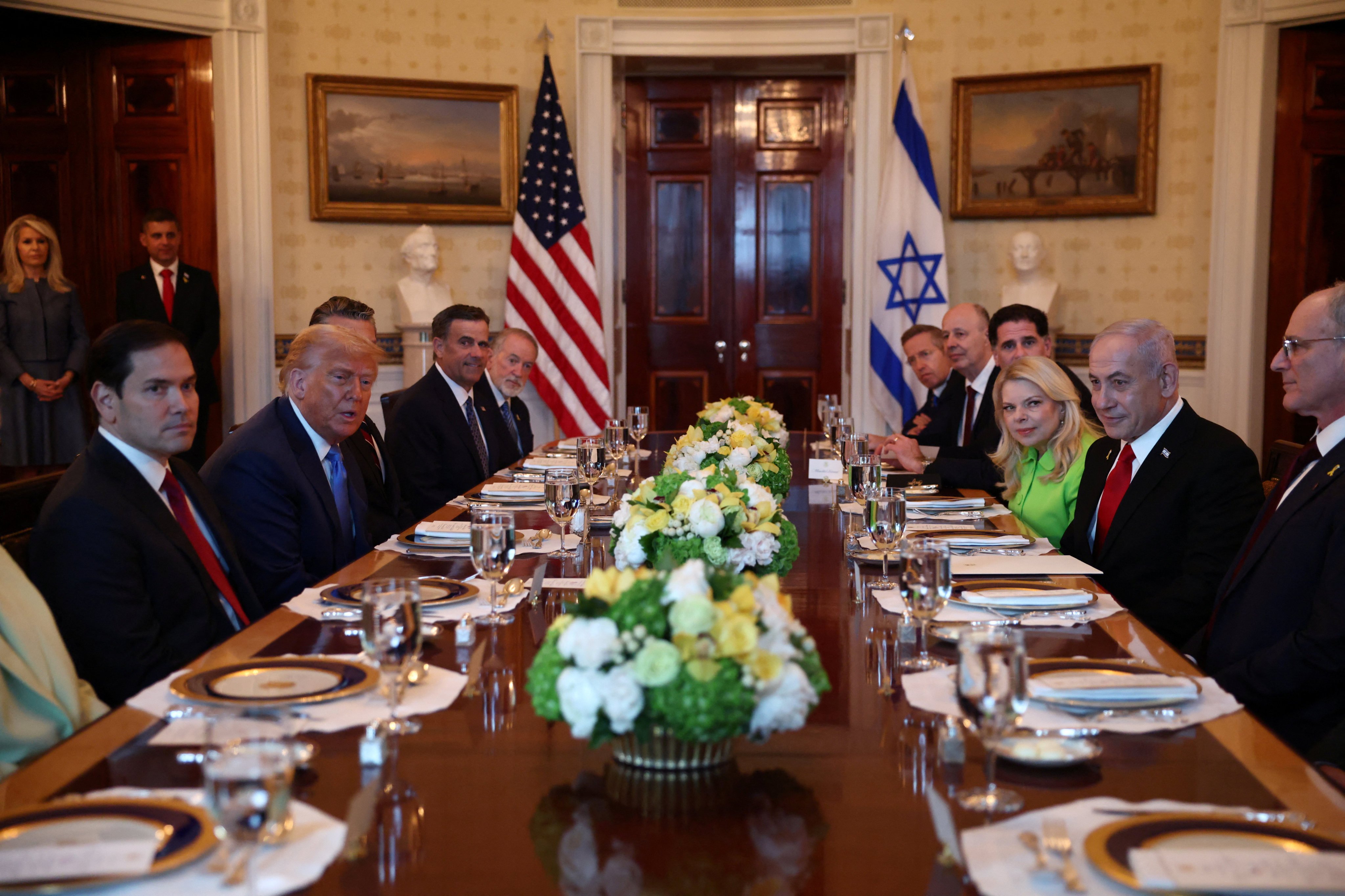 US President Donald Trump, left, and Israeli Prime Minister Benjamin Netanyahu, right, at a dinner at the White House in Washington on Monday. Photo: Reuters