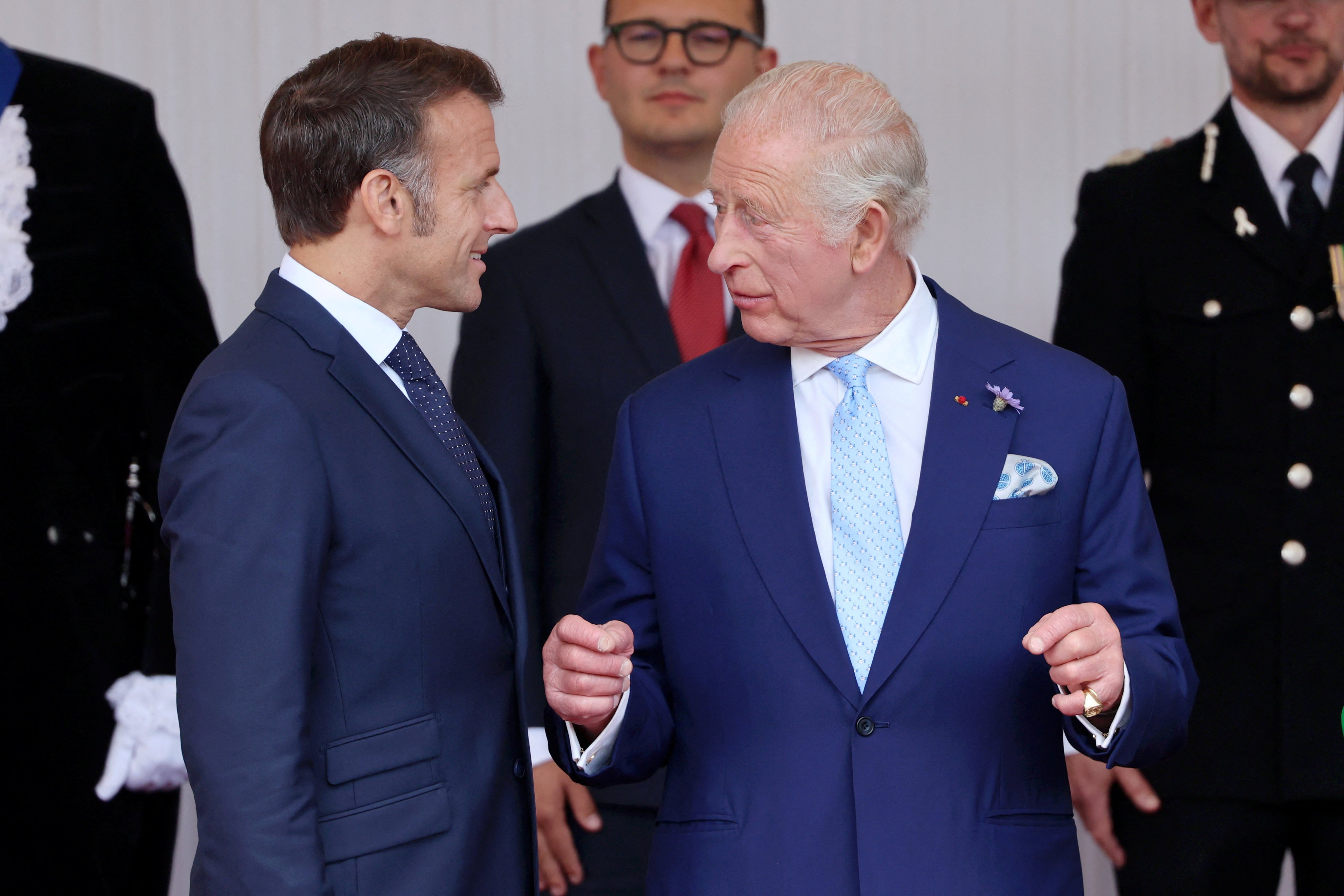 President of France, Emmanuel Macron and King Charles speak in Windsor, England on Tuesday. Photo: Reuters