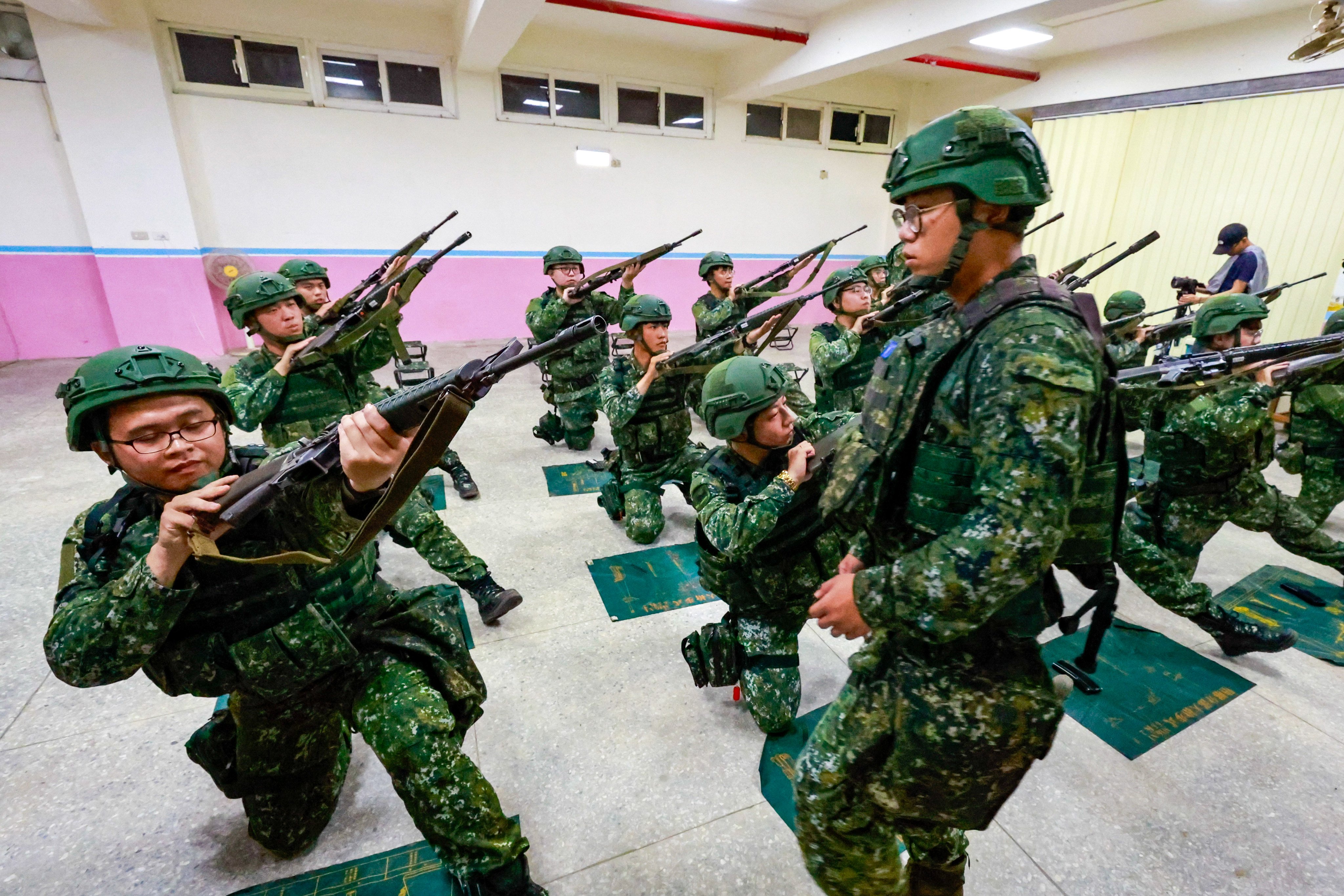 Taiwanese military reservists conduct pre-combat training during the annual Han Kuang military exercises in Taiwan on Wednesday. This year’s drill has been doubled in length to 10 days. Photo: EPA