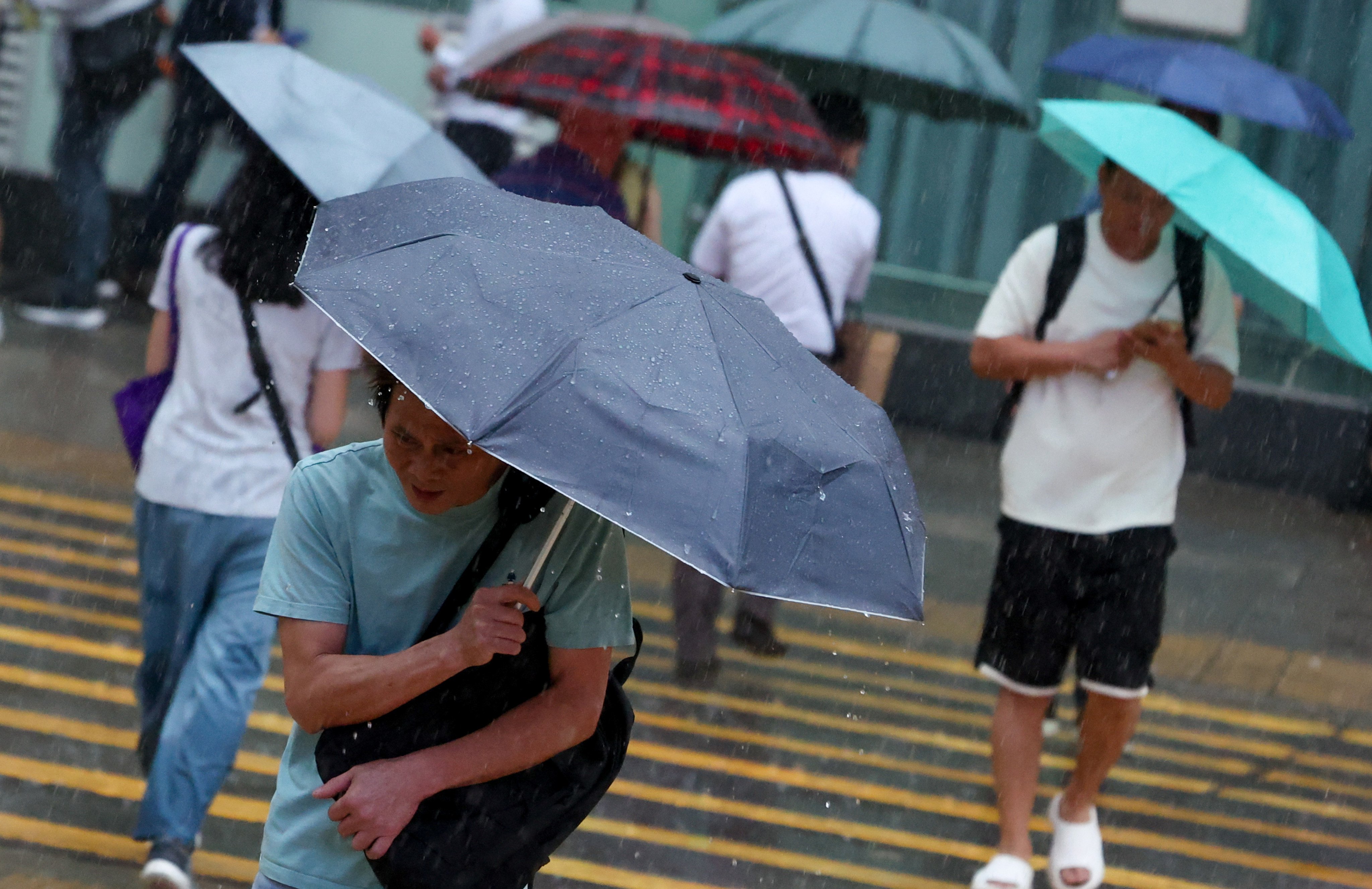 The signal, issued at 11.45pm, means that heavy rain has fallen or is expected to fall generally over Hong Kong, exceeding 50mm in an hour, and is likely to continue. Photo: Dickson Lee