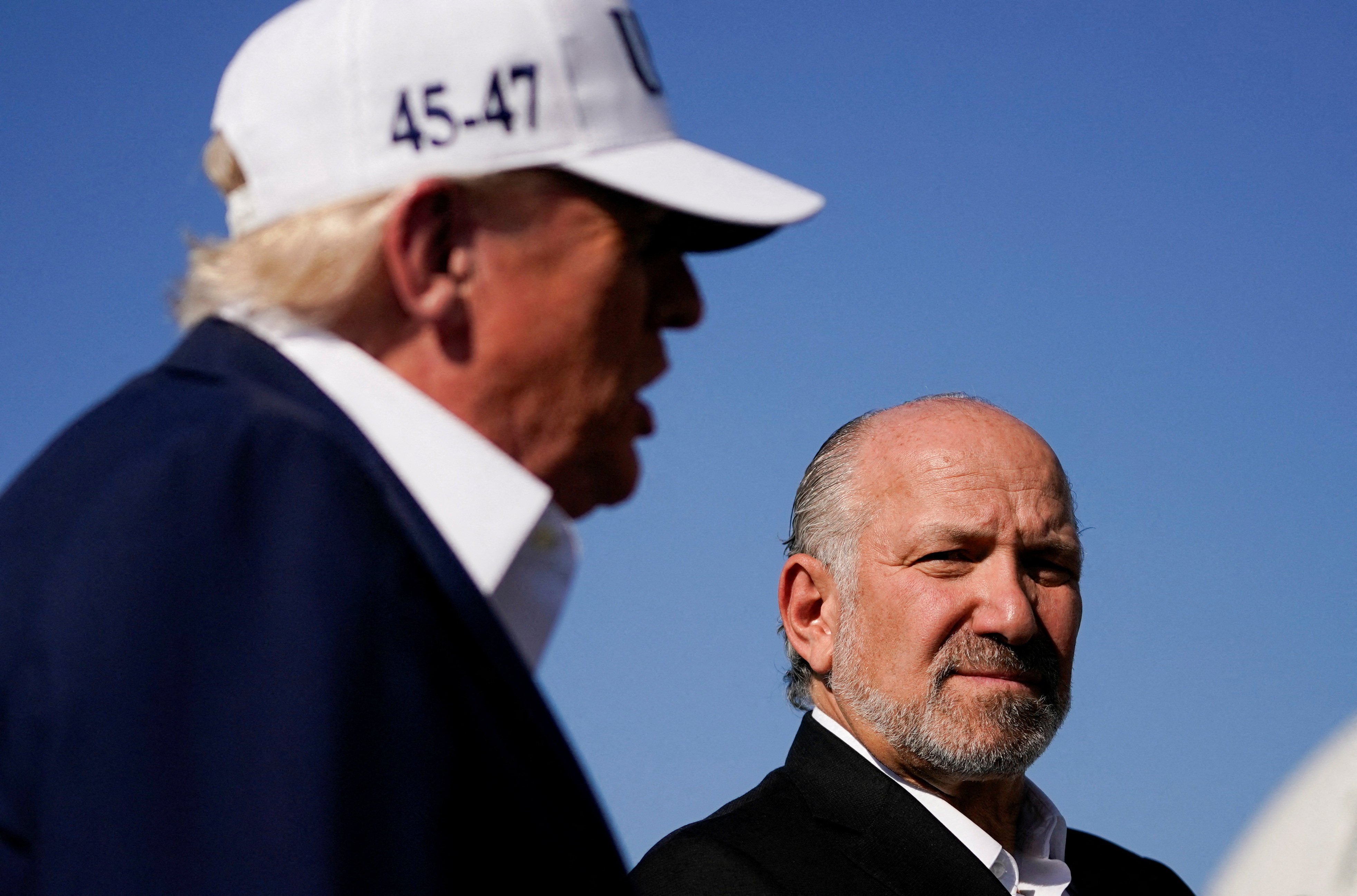 US President Donald Trump stands next to US Secretary of Commerce Howard Lutnick in Morristown, New Jersey on July 6. Photo: Reuters