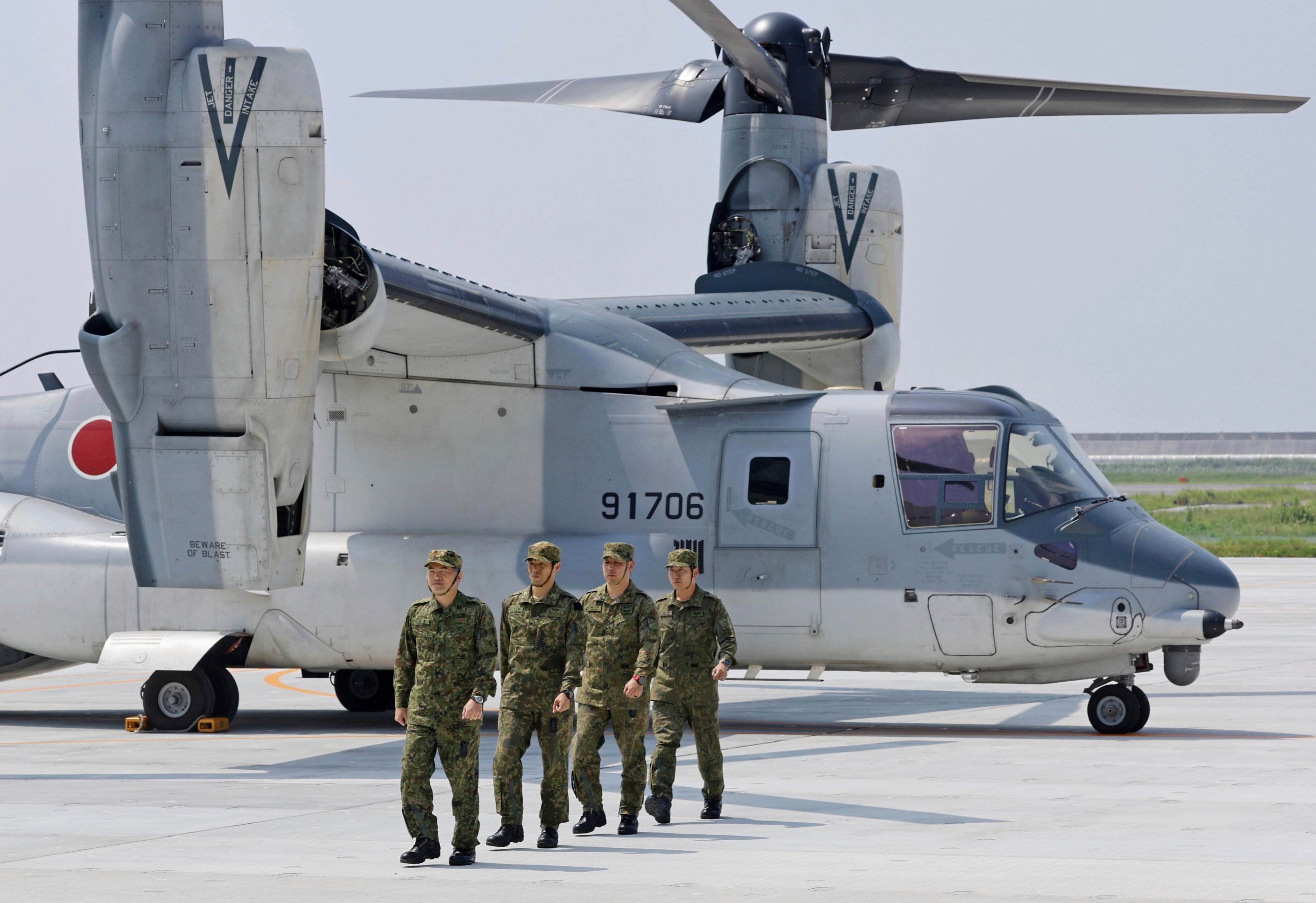 Members of Japan’s Ground Self-Defence Force disembark from a V-22 Osprey at Camp Saga on Wednesday. Photo: Kyodo News via AP