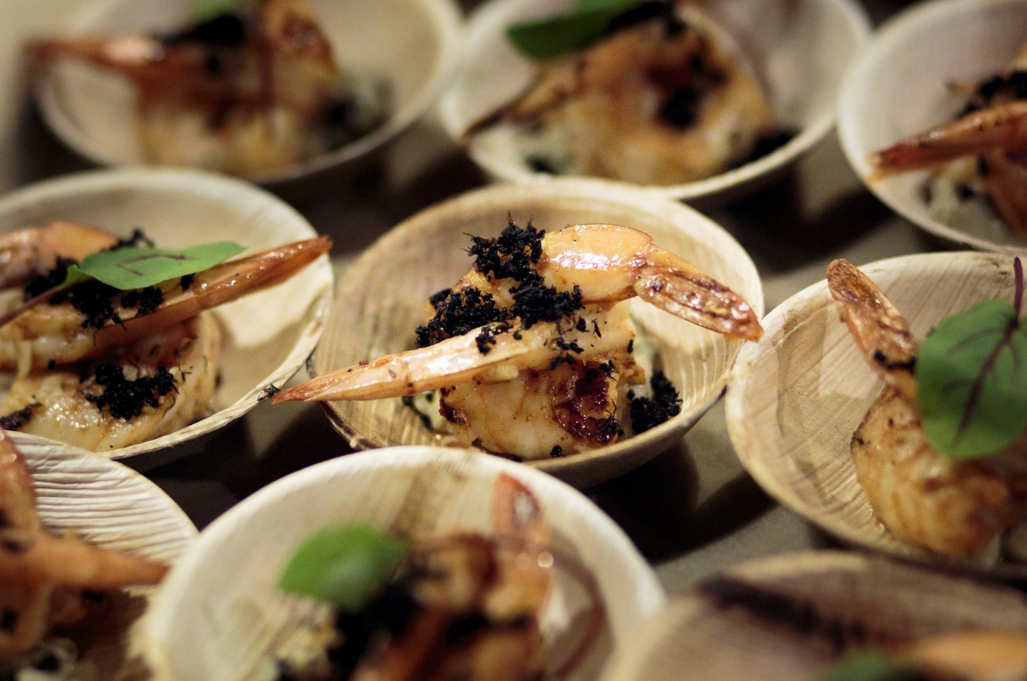 A dish of jumbo shrimp topped with black ants served at a kitchen in New York. Photo: EPA-EFE A dish of jumbo shrimp topped with black ants served at a kitchen in New York. Photo: EPA-EFE