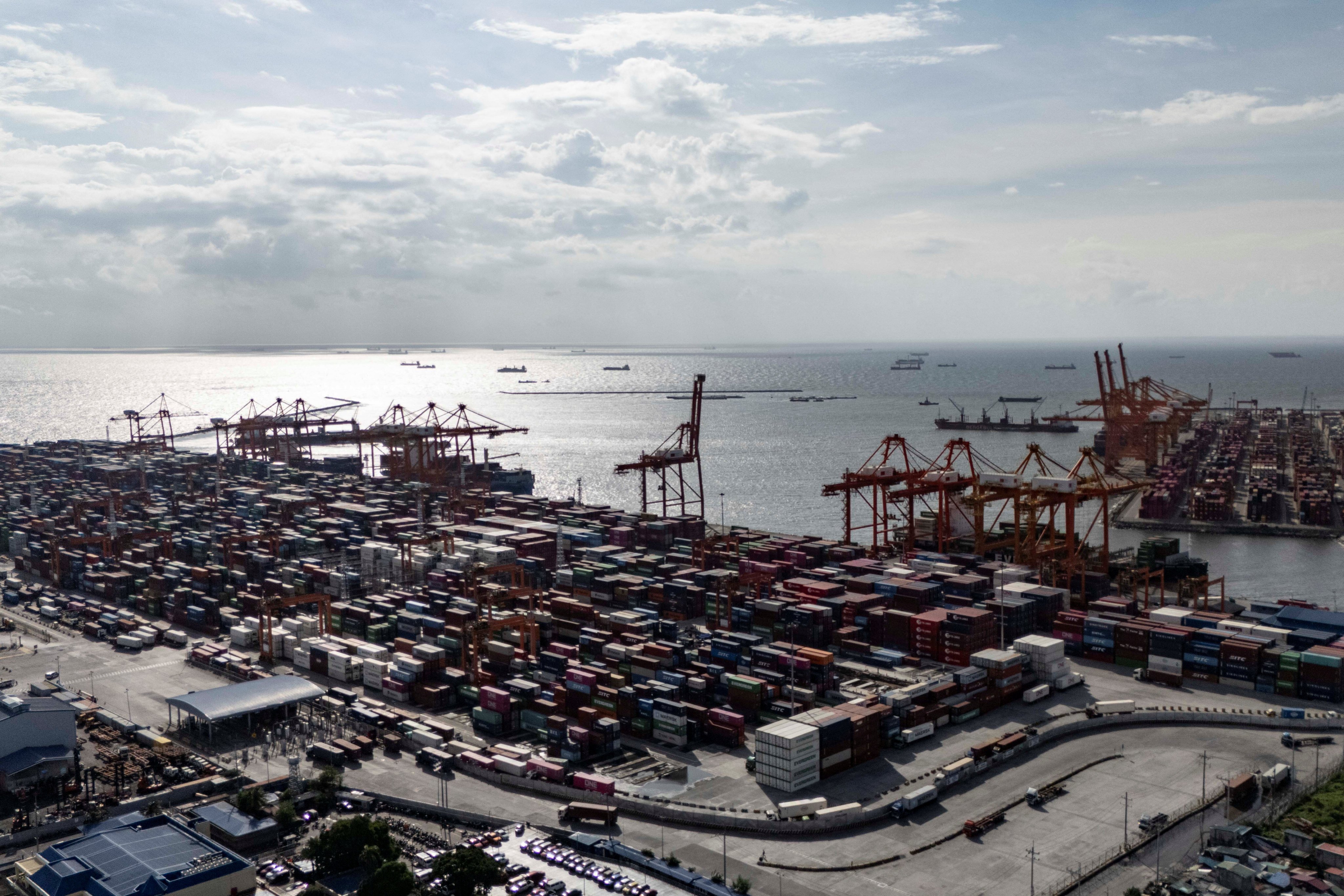 The Manila International Container Terminal in Manila. Philippine officials are heading to the US for trade talks after Washington announced a 20 per cent tariff on Philippine imports. Photo: Reuters