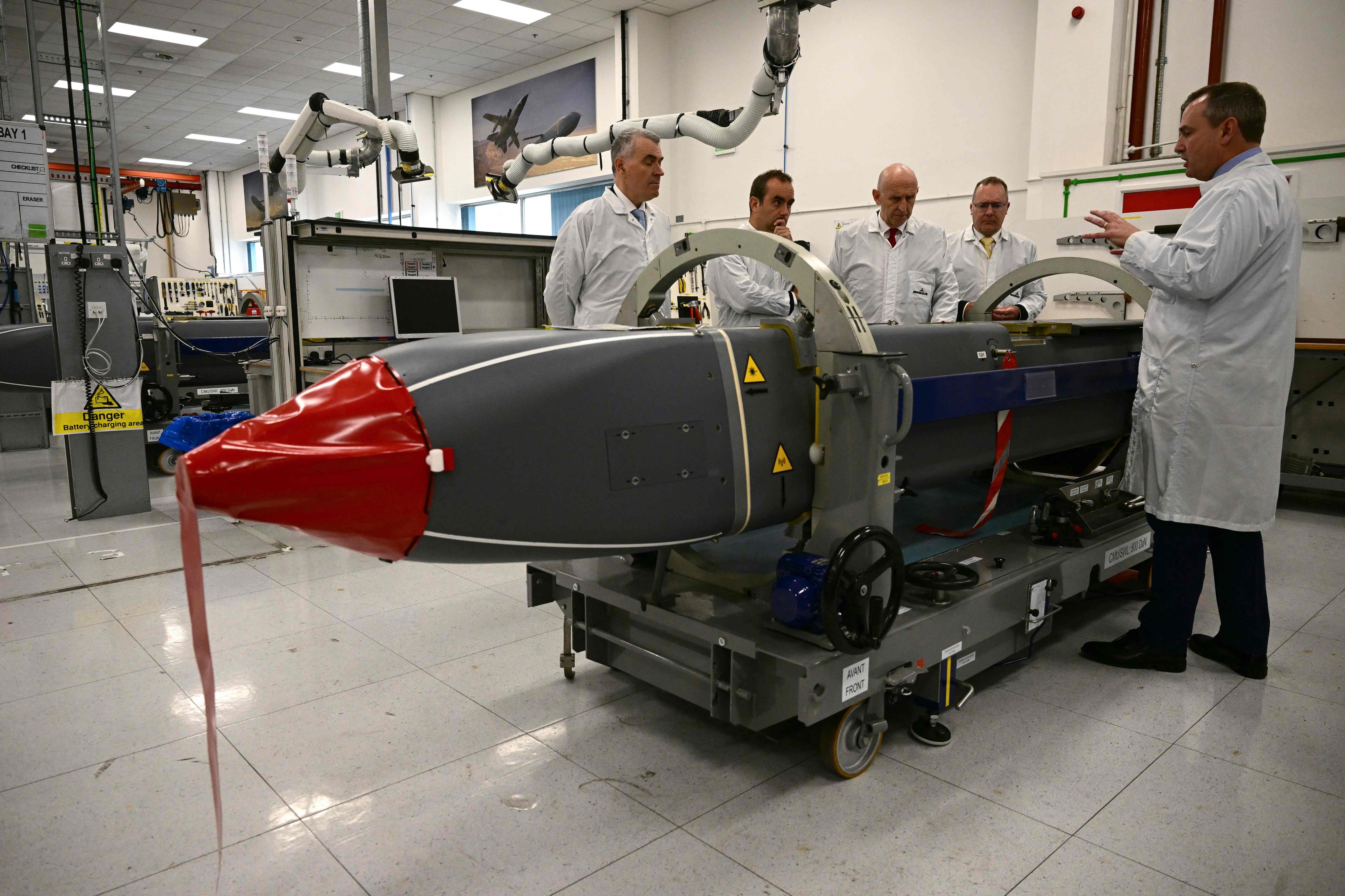Britain’s Defence Secretary John Healey (centre) and his French counterpart Sebastien Lecornu (second left), are shown Storm Shadow missiles during a visit to MBDA missile factory in Stevenage, England, on Tuesday. Photo: AFP