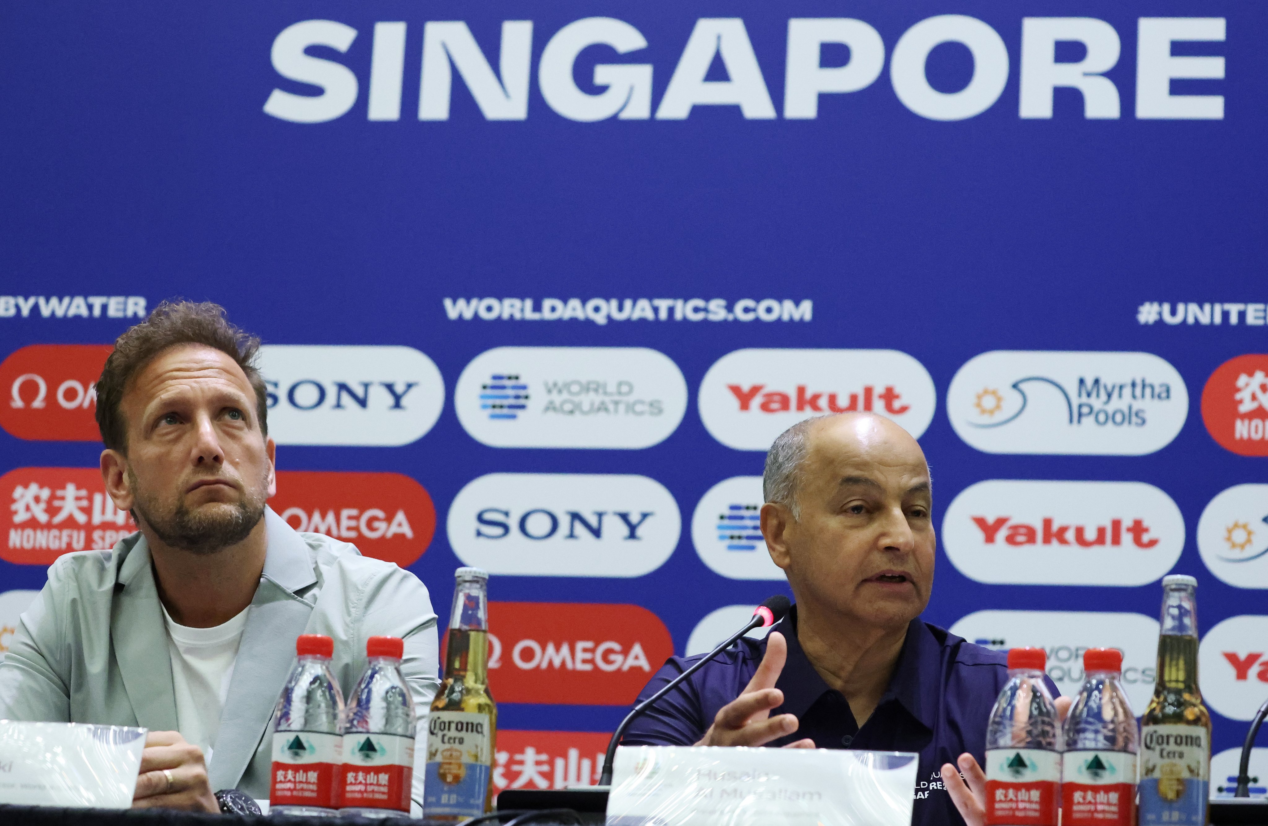 Brent Nowicki (left), World Aquatics’ executive director, and  Husain Al Musallam, the body’s president, at the opening press conference of the World Aquatics Championships in Singapore on Thursday. Photo: EPA