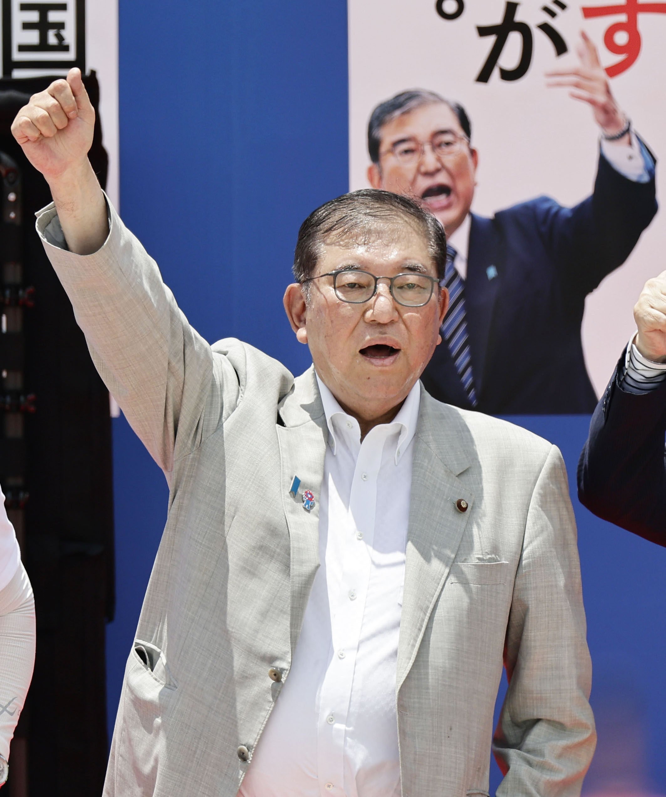 Japanese Prime Minister Shigeru Ishiba, leader of the ruling Liberal Democratic Party, raises his fist after delivering a speech in the southwestern Japan city of Kagoshima on Monday. Photo: Kyodo