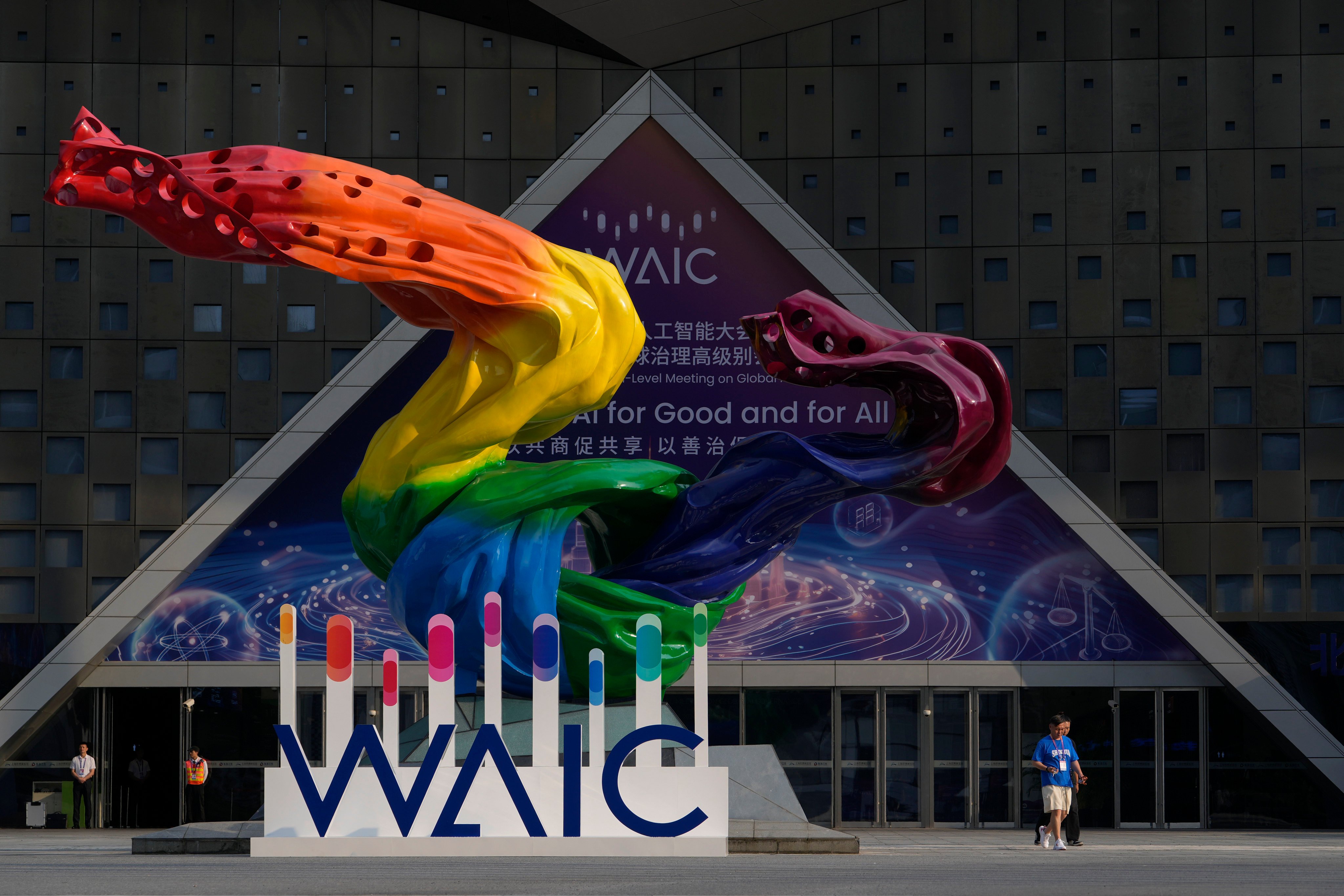 A billboard and sculpture are seen at the 2024 World Artificial Intelligence Conference (WAIC) in Shanghai on July 3, 2024. Photo: AP Photo