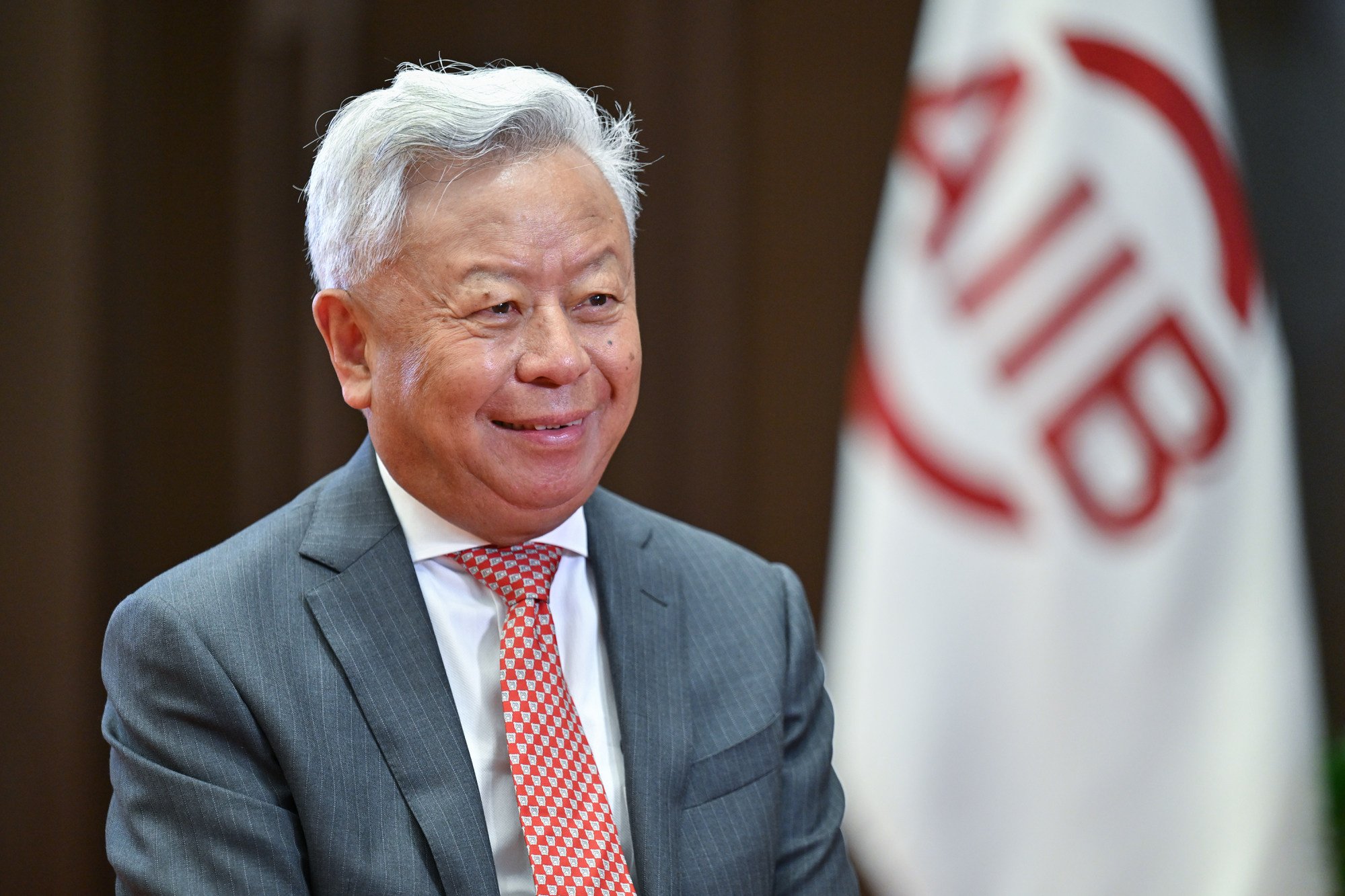 AIIB president Jin Liqun being interviewed by Xinhua at the bank’s headquarters in Beijing on June 20. Photo: Xinhua