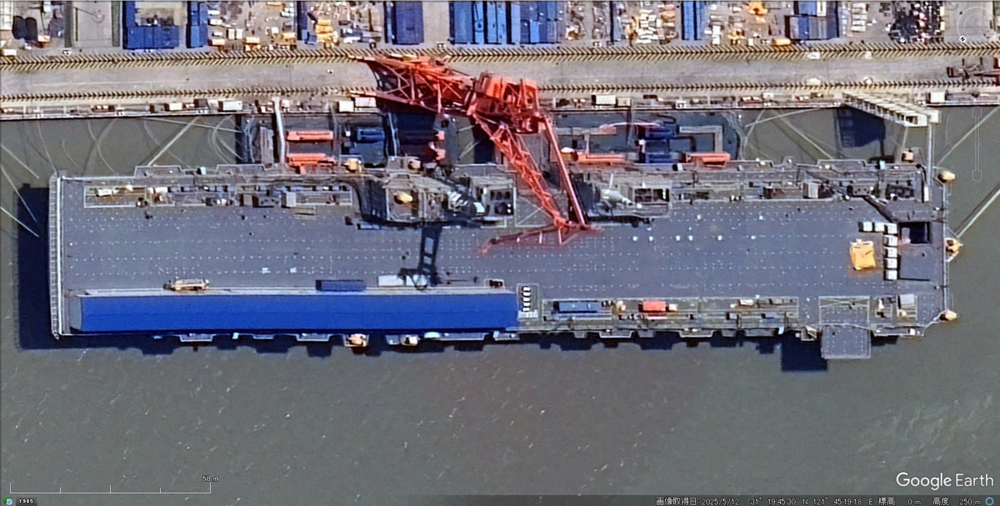 Type 076 amphibious assault ship the Sichuan is seen with its electromagnetic catapult covered. Photo: Google Earth