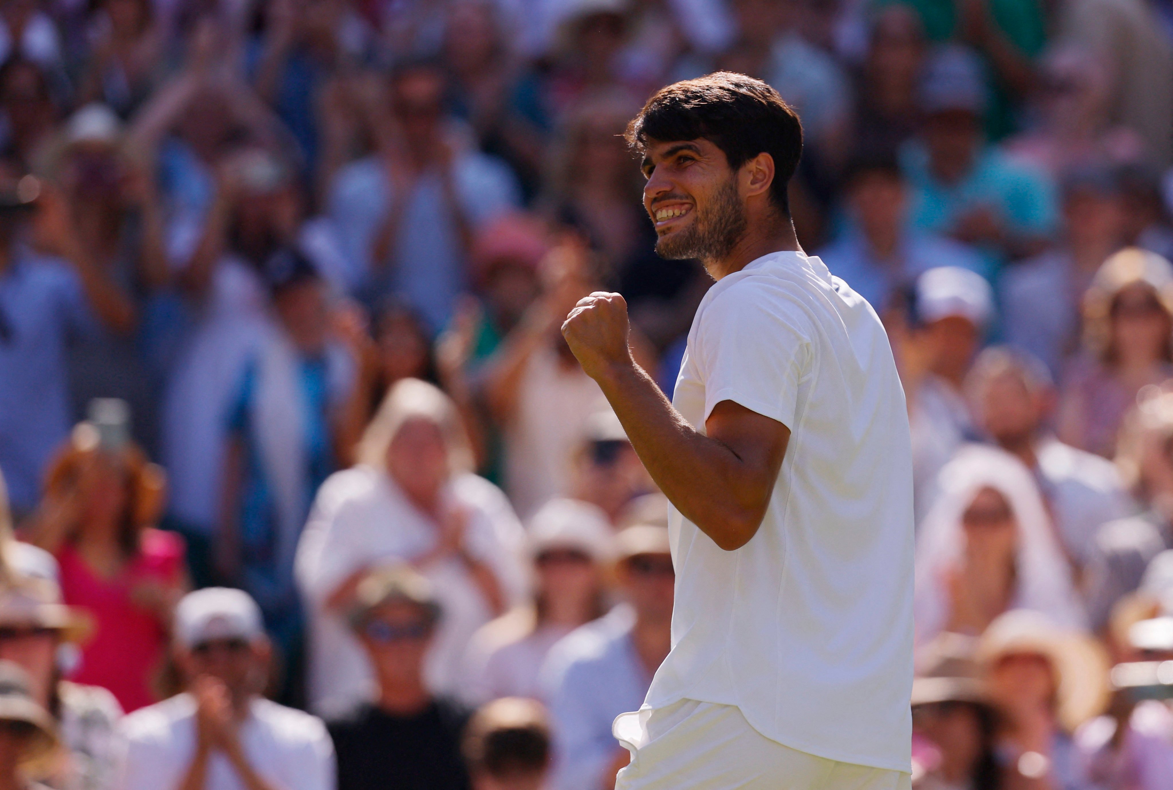 Spain’s Carlos Alcaraz celebrates winning his men’s singles semi-final match against Taylor Fritz. Photo: Reuters