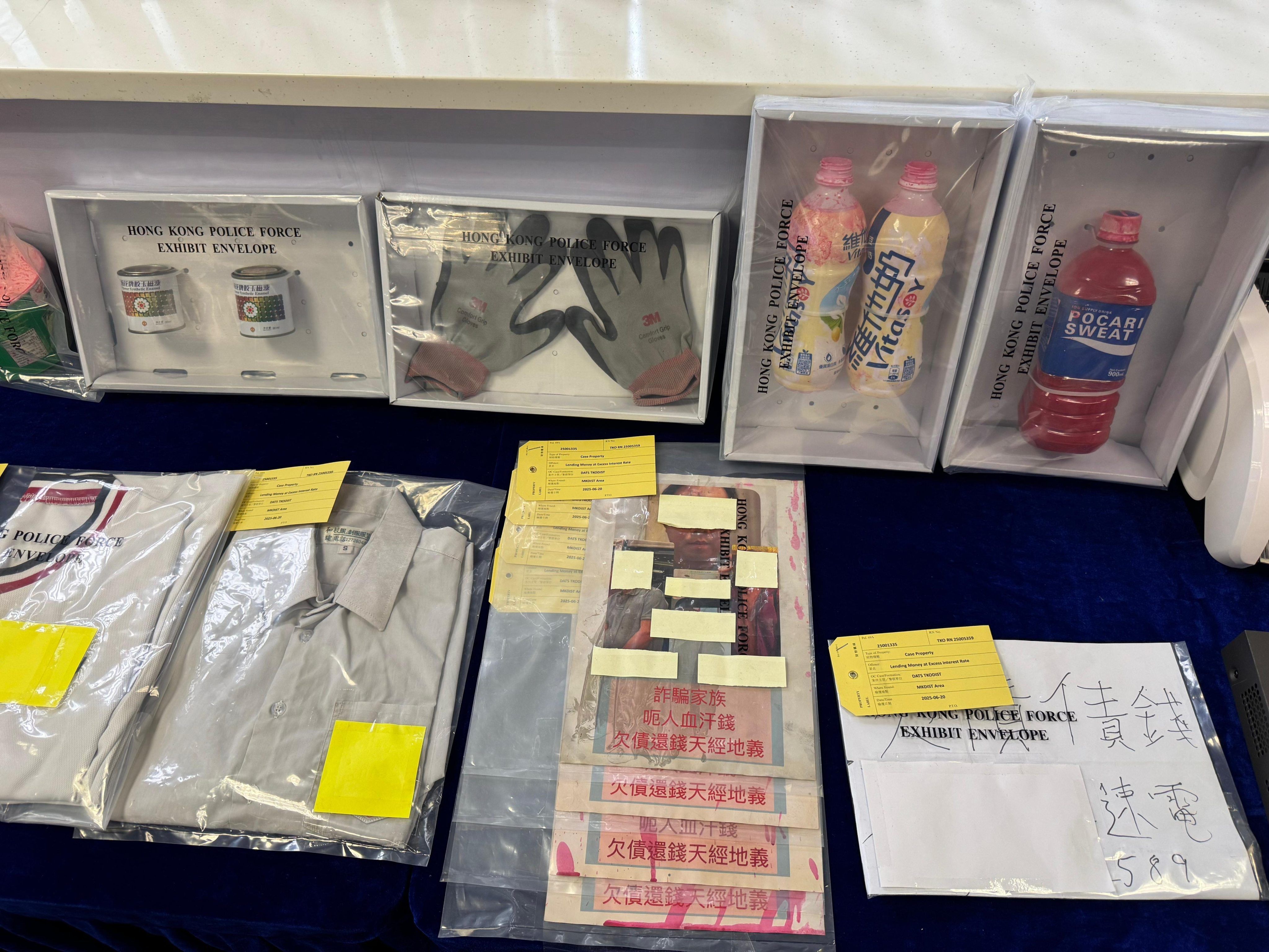 Gloves, paint and humiliating posters were among the accoutrements of suspected debt collectors recently arrested by Hong Kong police on suspicion of criminal damage and intimidation. Photo: Handout