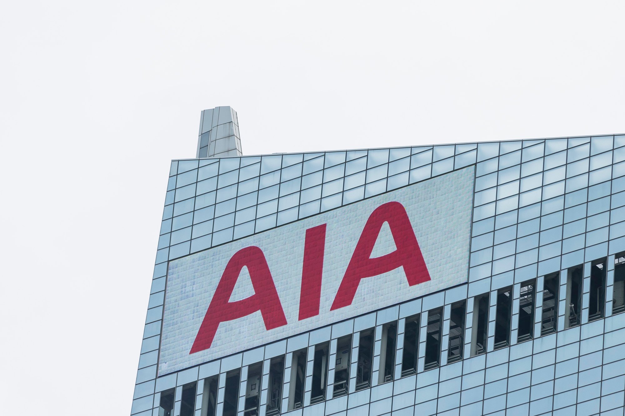 AIA’s logo is displayed atop at the AIA Central building on July 16, 2018 in Hong Kong. Photo: Getty Images AIA’s logo is displayed atop at the AIA Central building on July 16, 2018 in Hong Kong. Photo: Getty Images