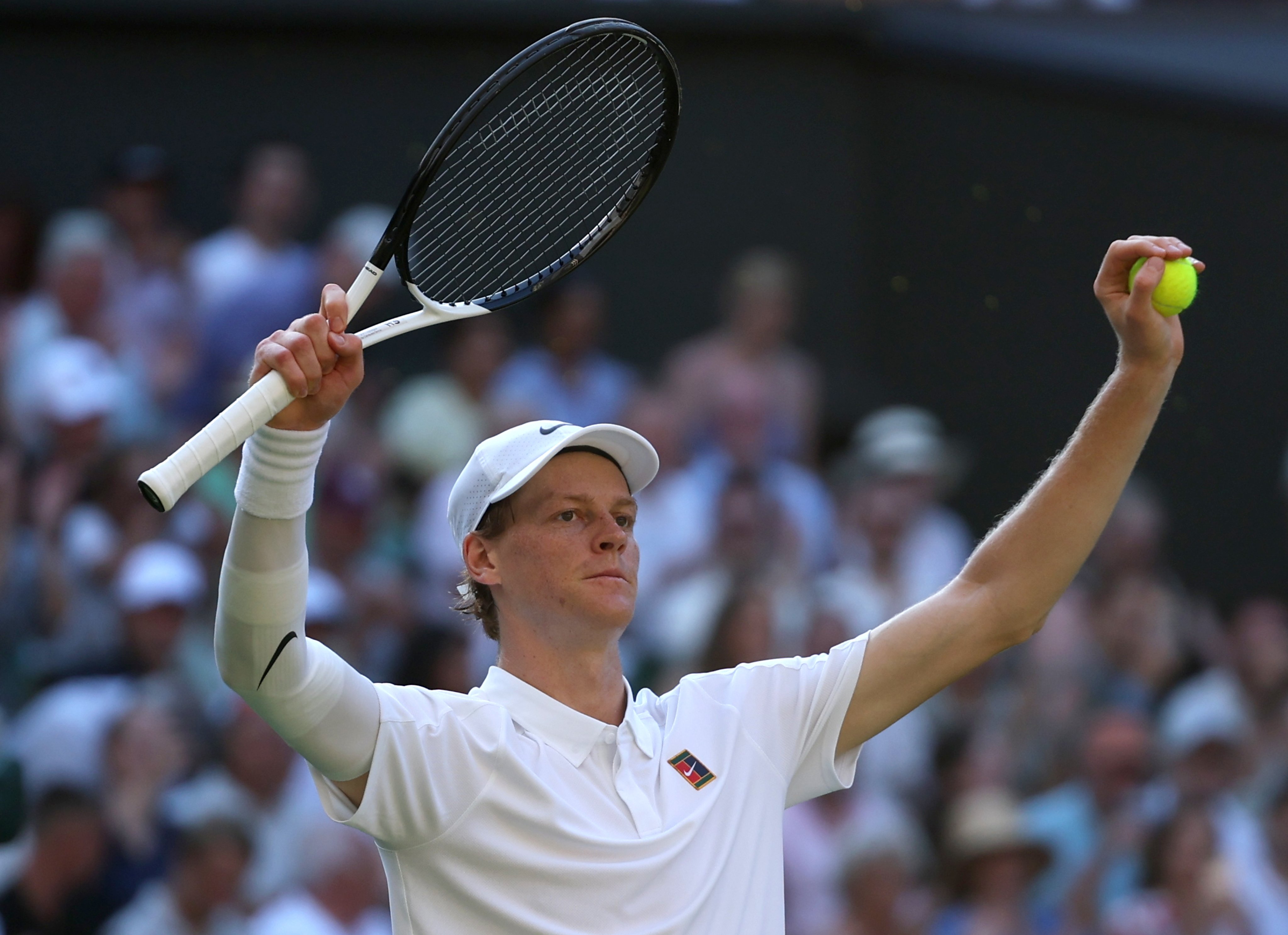 Jannik Sinner of Italy celebrates winning his semi-finals match against Novak Djokovic of Serbia at Wimbledon on Friday. Photo: EPA