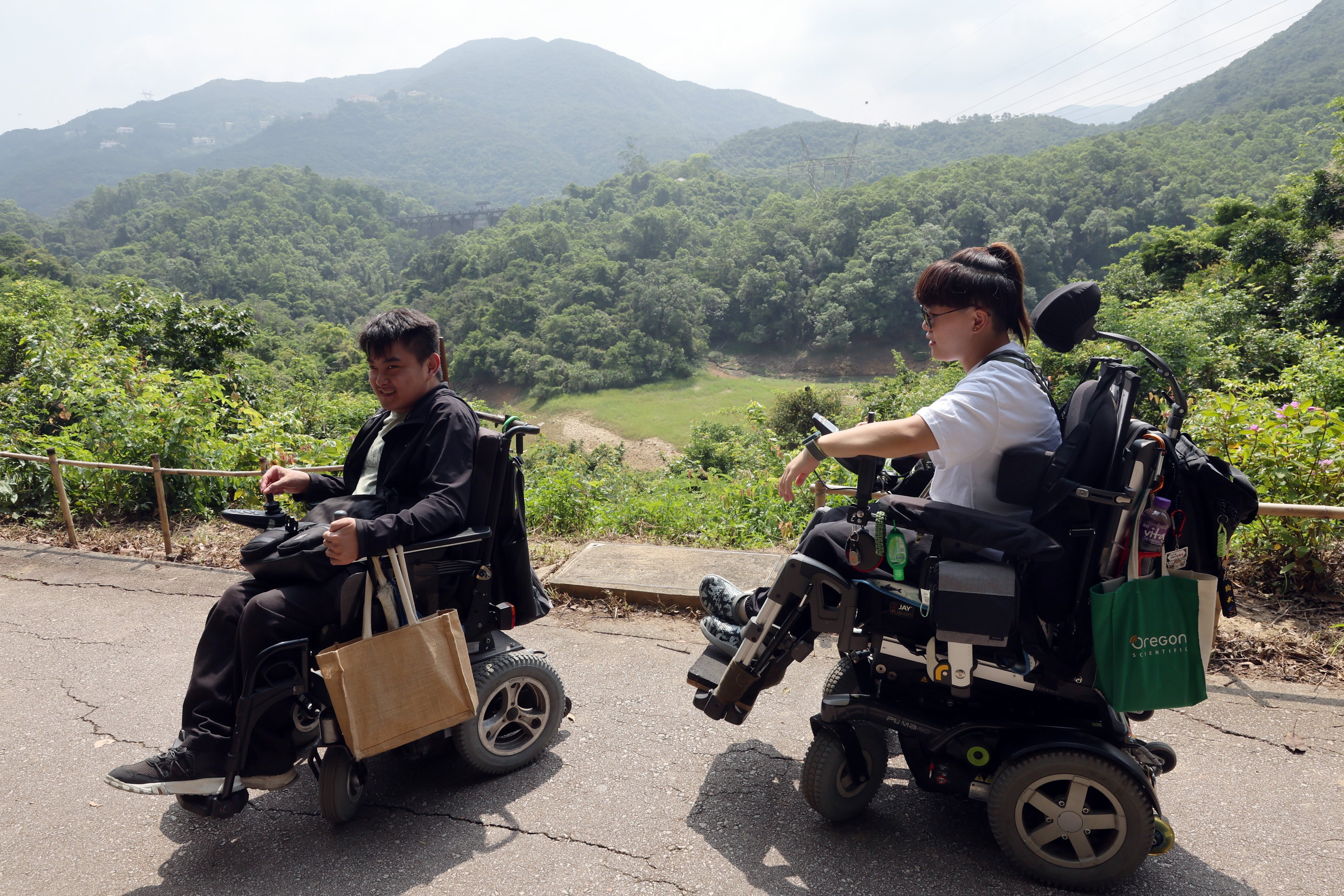 Wheelchair users Au Yeung Kai-sang (left) and Hester Chan. Photo: Edmond So