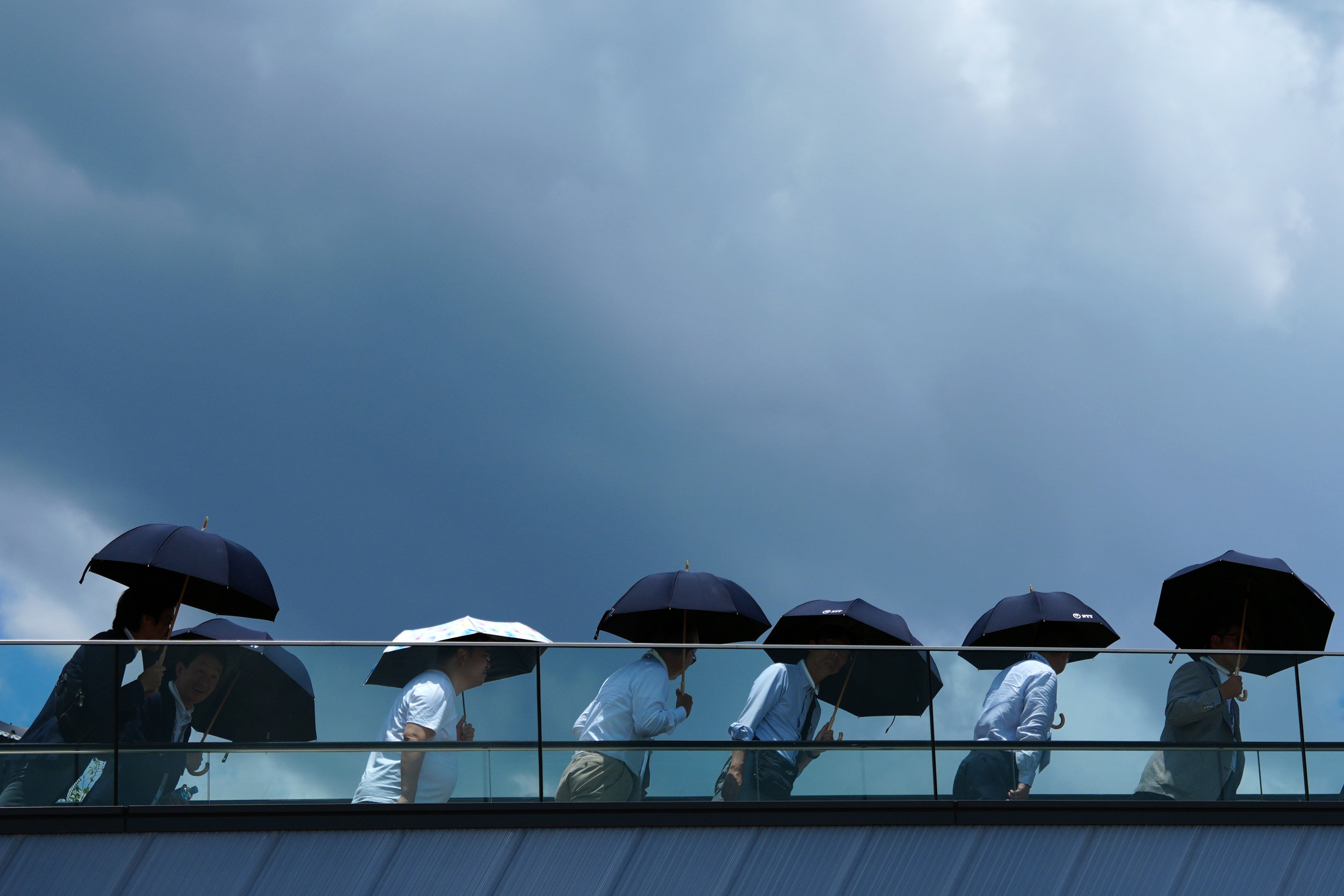 Tourists visit the Expo 2025 Osaka in Osaka, Japan, on Thursday. Japan has been hit by a searing heatwave. Photo: Xinhua