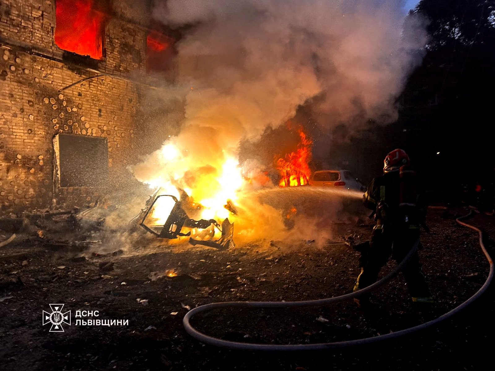 A firefighter works at the site of a Russian drone strike in Lviv, Ukraine on Saturday. Photo: Press service of the State Emergency Service of Ukraine/Reuters