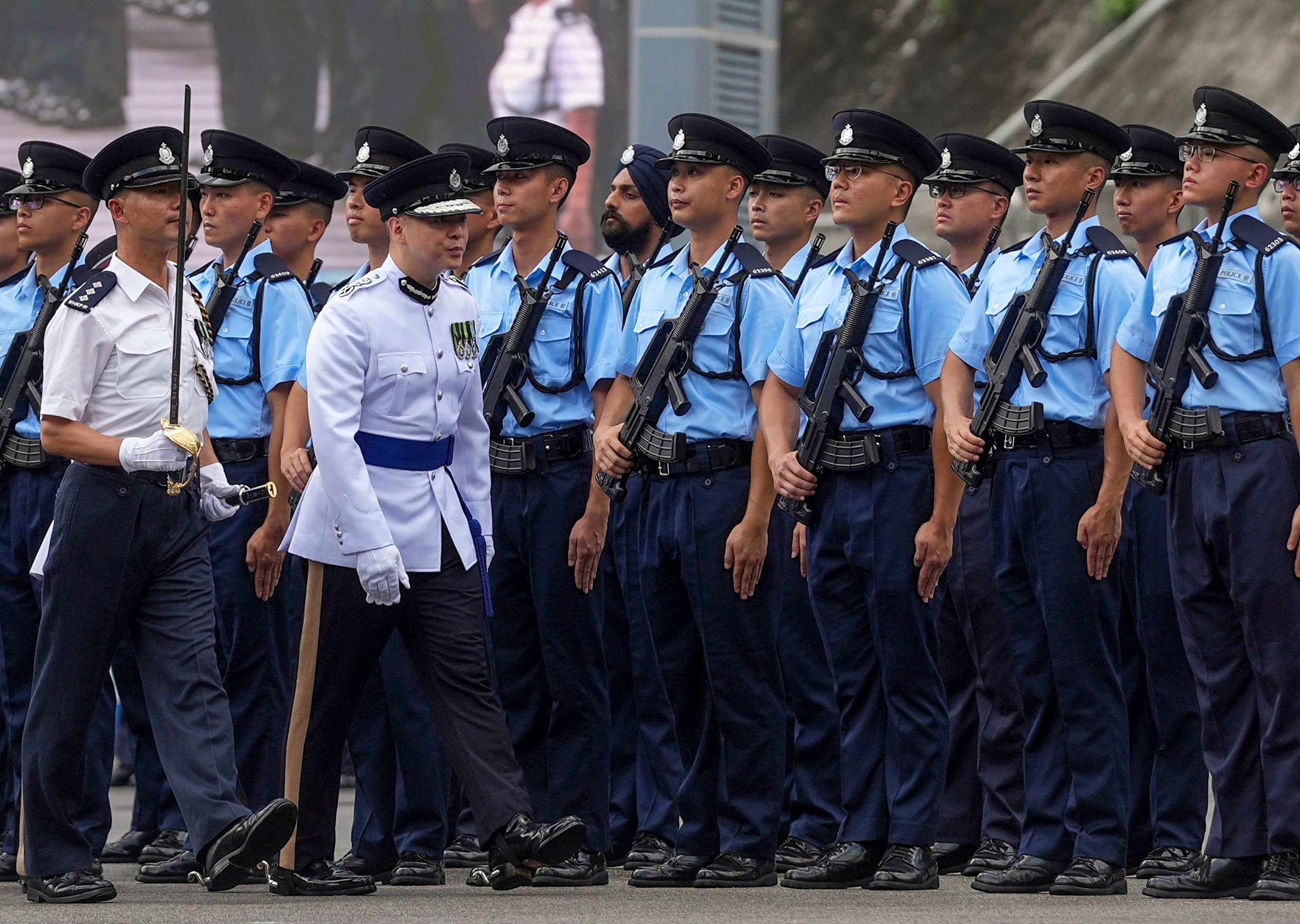 Commissioner of Police Joe Chow inspects the force’s new recruits on Saturday. Photo: Elson Li