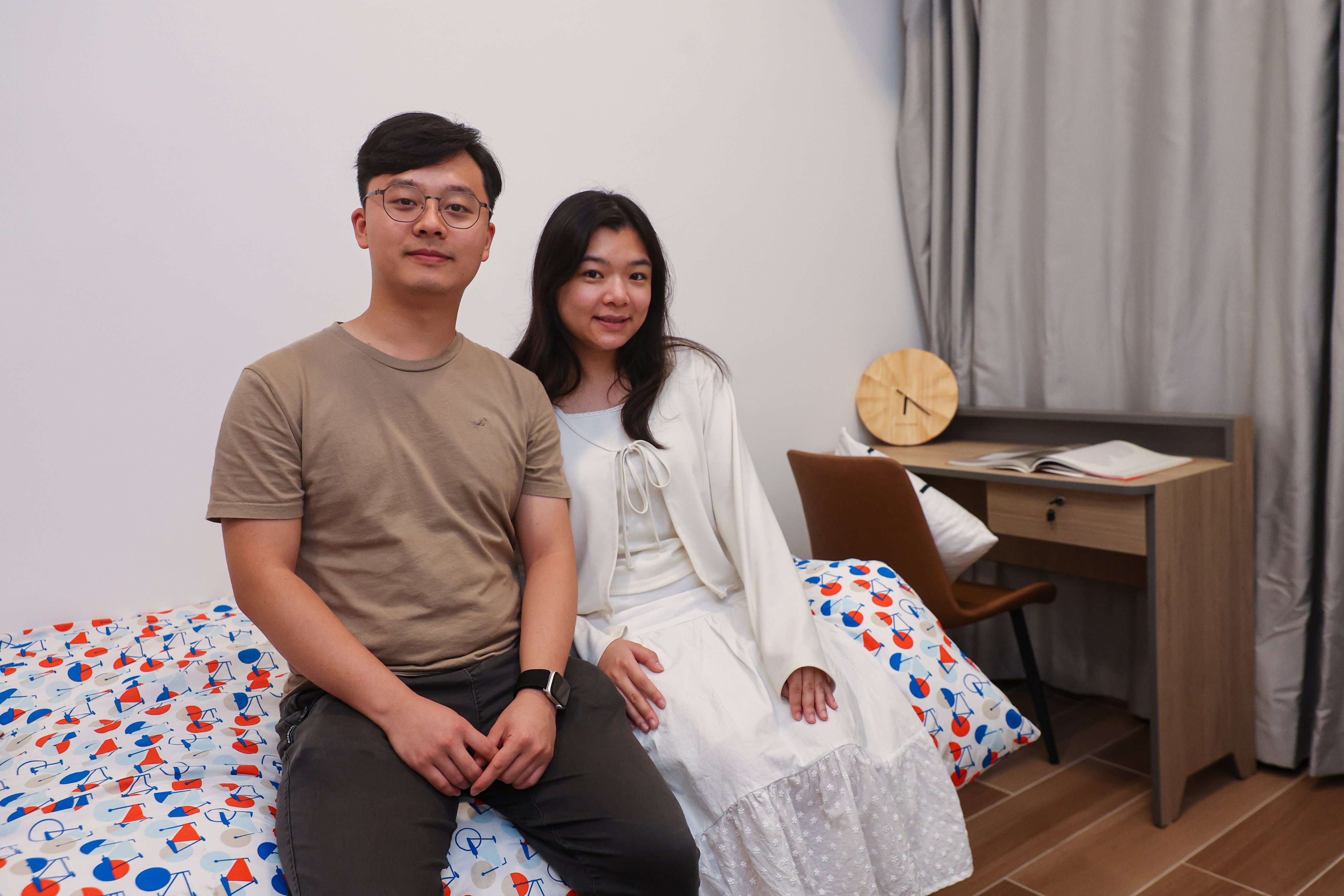 Kobe Chung, a 24-year-old working in the engineering sector, and his girlfriend Mandy Chung, 24, earn a combined salary of about HK$30,000 (US$3,820) a month. Photo:Edmond So