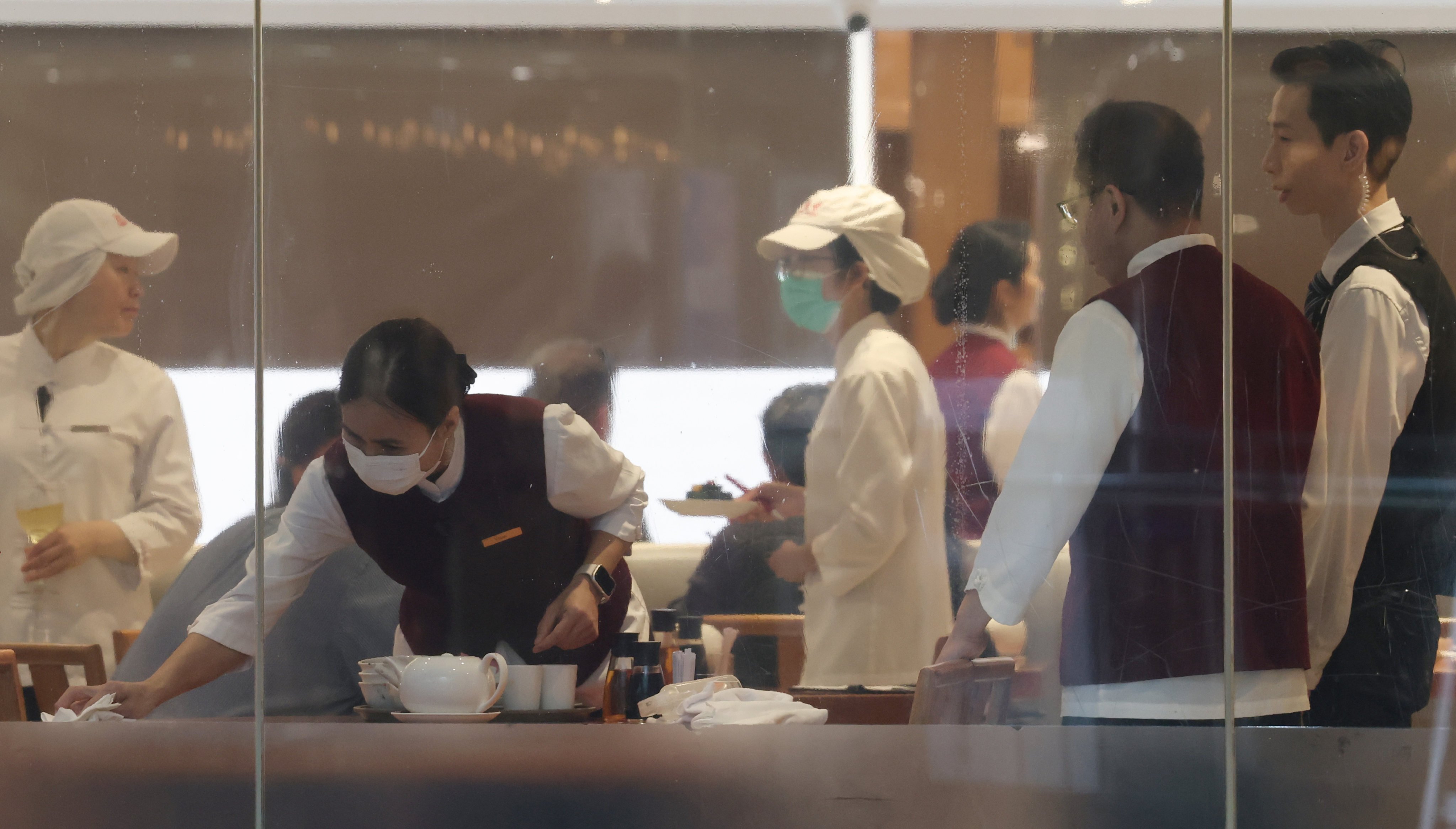 Official data shows that as of March, 54,278 workers were permitted to enter Hong Kong for 26 new job types, including waiters, junior chefs, and hospitality and sales staff in catering. Photo: Jelly Tse