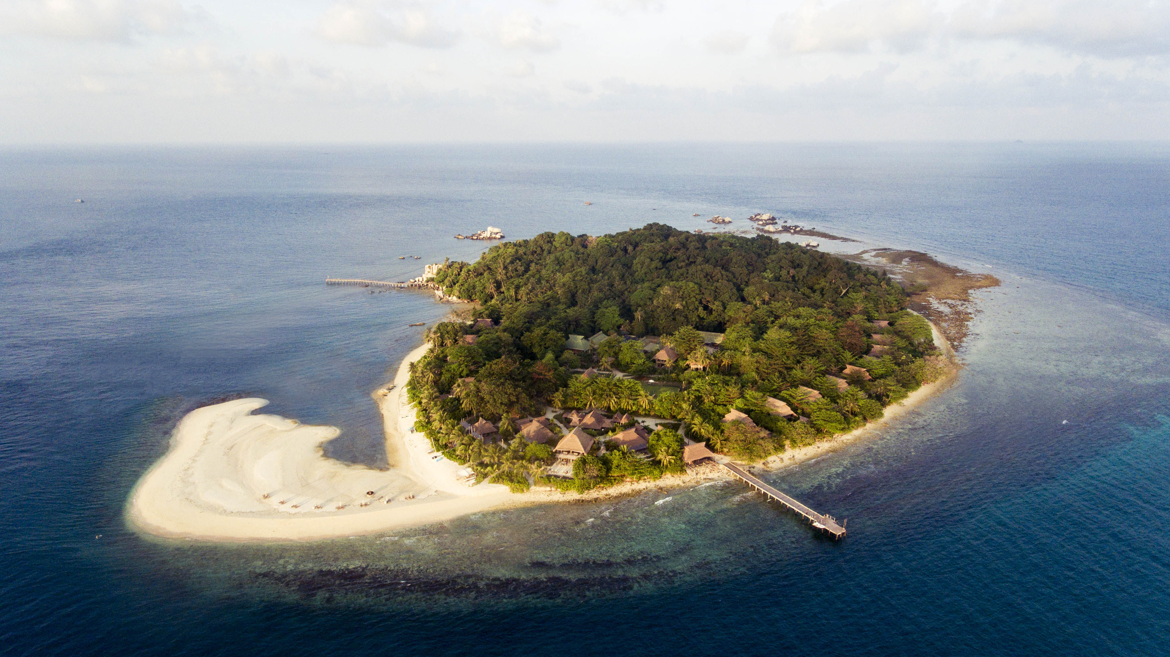 Aerial view of Nikoi Island, a private island off the east coast of Bintan, Indonesia. Since November 2022, it has hosted the Ubah Rumah Residency for artists and researchers. (Photo: Nikoi Island)