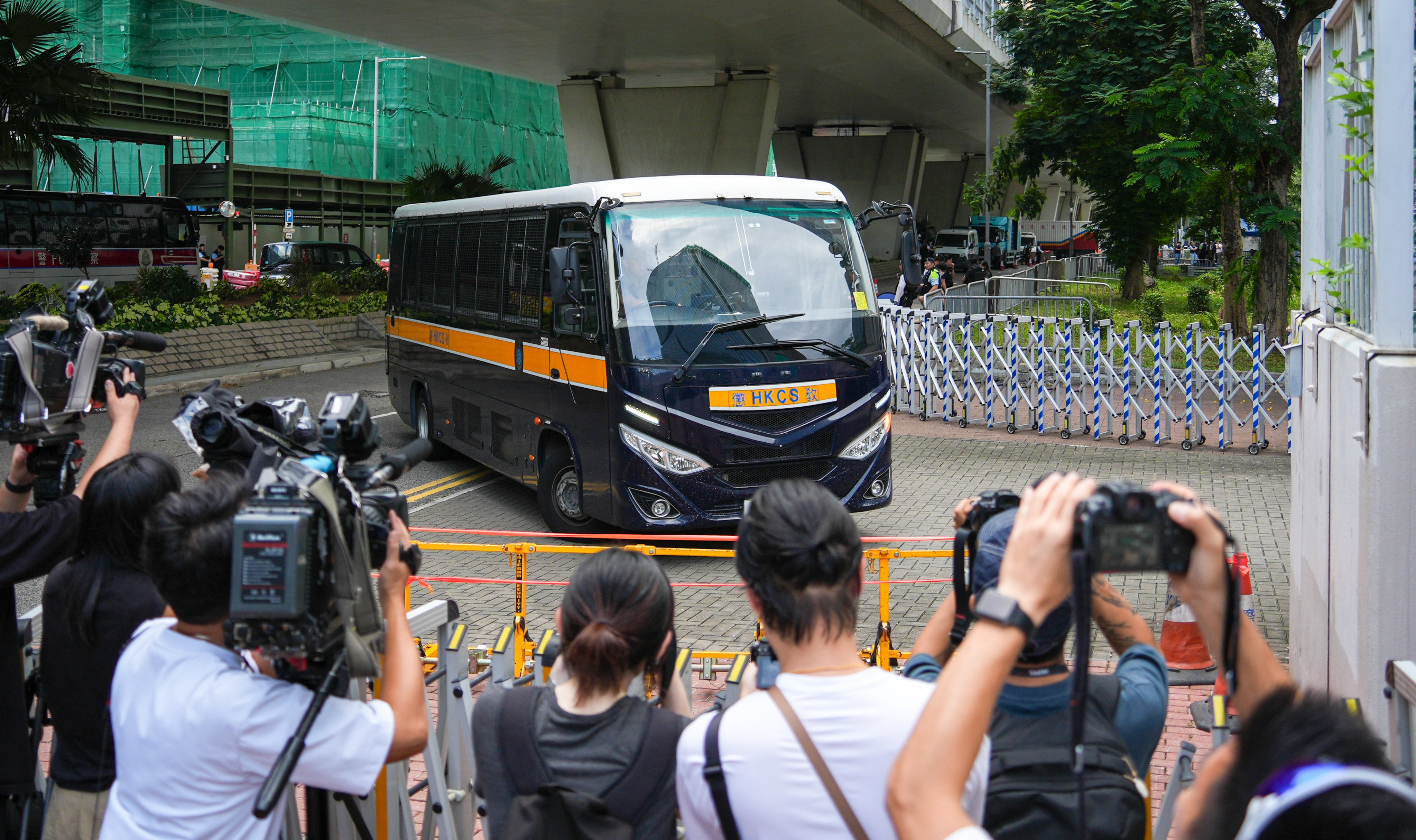 More than 100 police officers were stationed at West Kowloon Court for the first oral hearing in the case’s appeal proceedings. Photo: Eugene Lee