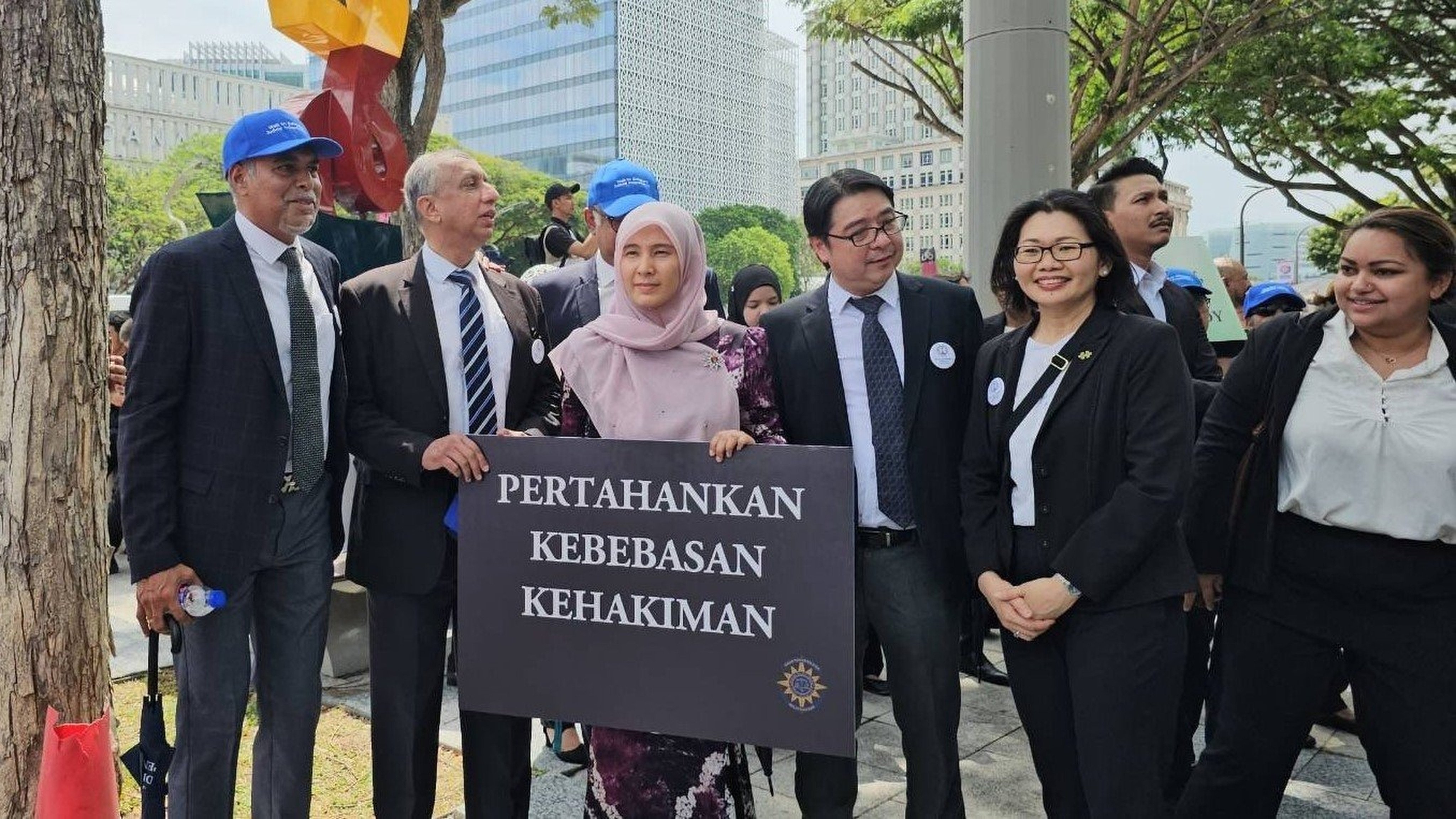 Prime Minister Anwar Ibrahim’s daughter Nurul Izzah (centre) marches with members of the Malaysian Bar to demand an investigation into the latest claims. Photo: Handout