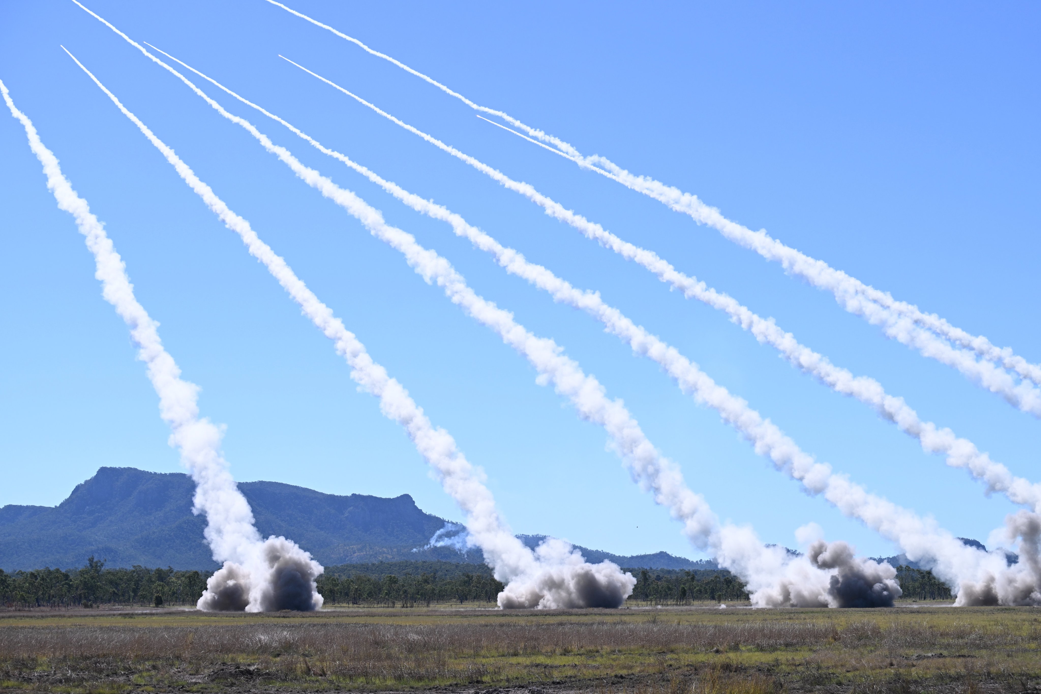 Australian and US HIMARS rockets are launched during the firepower demonstration as part of the Talisman Sabre 2025 joint military exercises on Monday. Photo: EPA