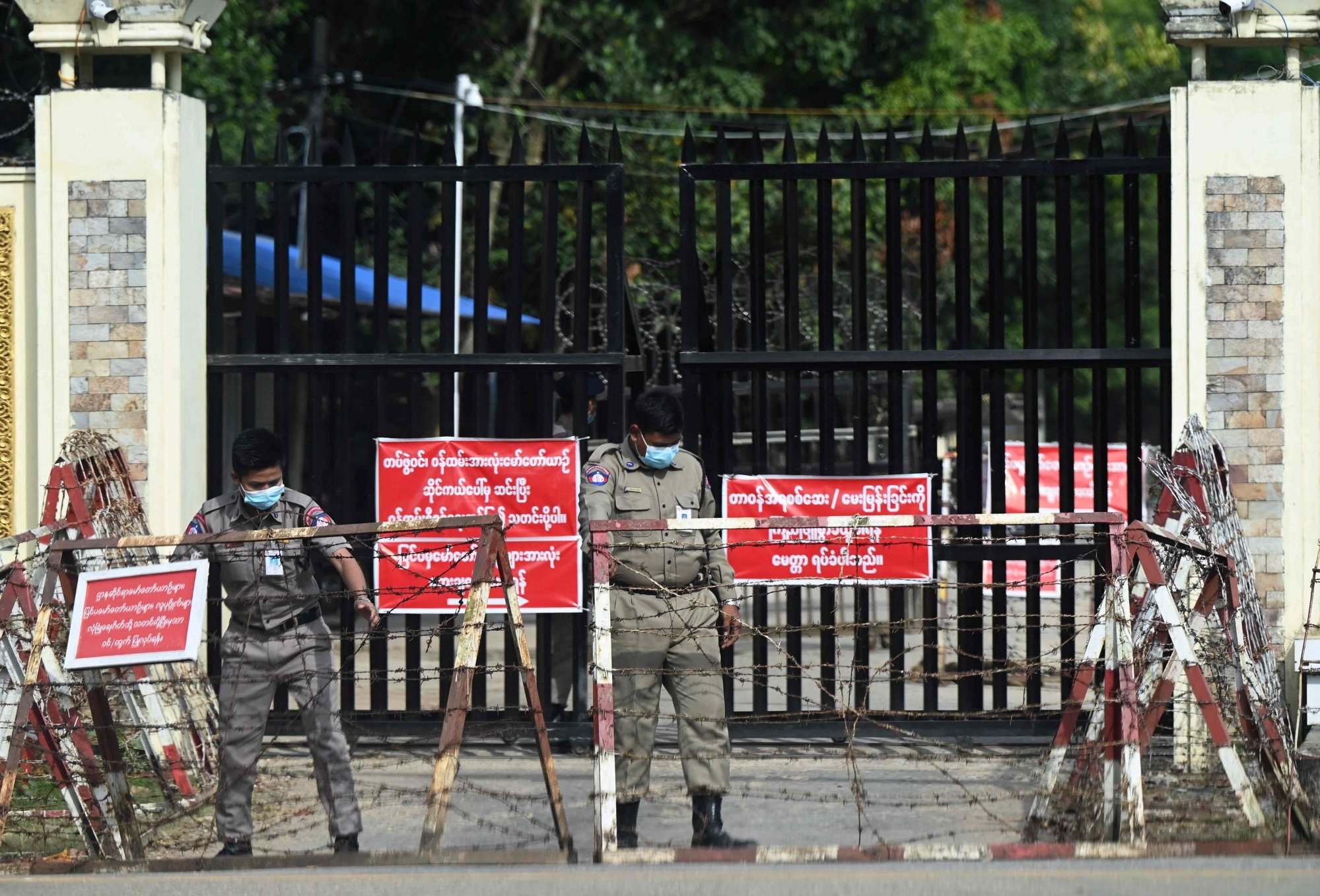 Prison security officials outside Insein Prison in Yangon. Photo: AFP Prison security officials outside Insein Prison in Yangon. Photo: AFP