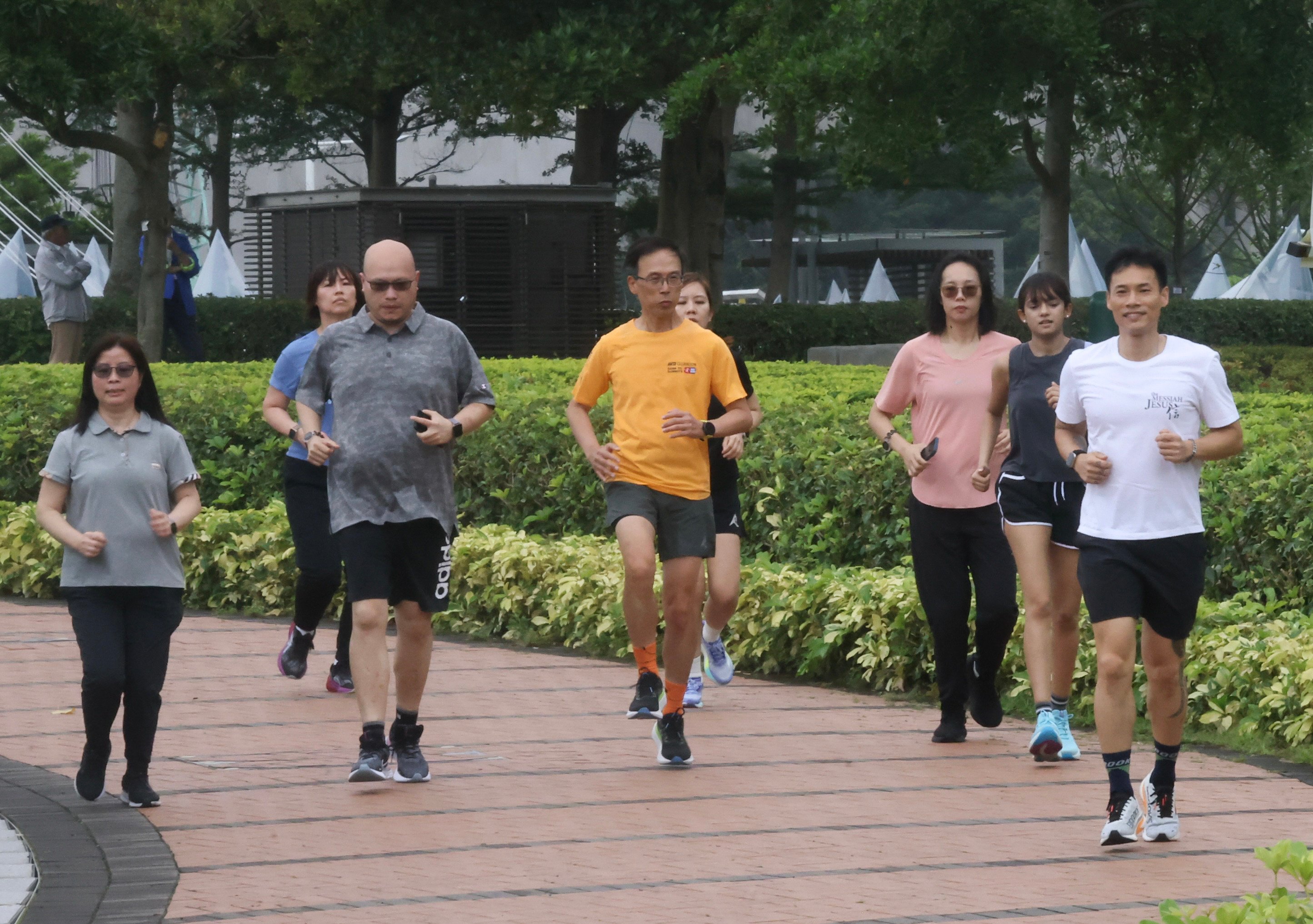 A group of Hong Kong residents jogging in Central. Photo: Jonathan Wong
