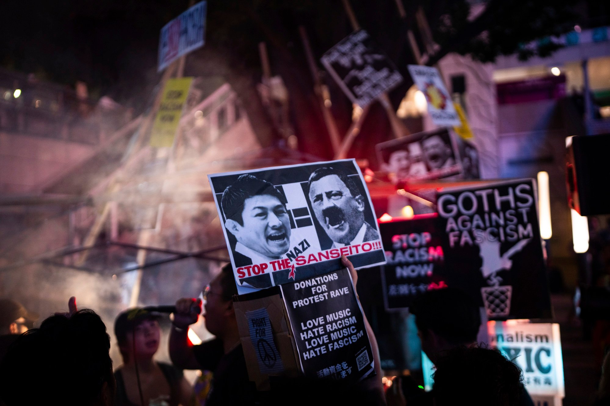 Demonstrators protest against racism and nationalist party Sanseito in Shinjuku, Tokyo ahead of the upper house election on Sunday. Photo: AP Demonstrators protest against racism and nationalist party Sanseito in Shinjuku, Tokyo ahead of the upper house election on Sunday. Photo: AP