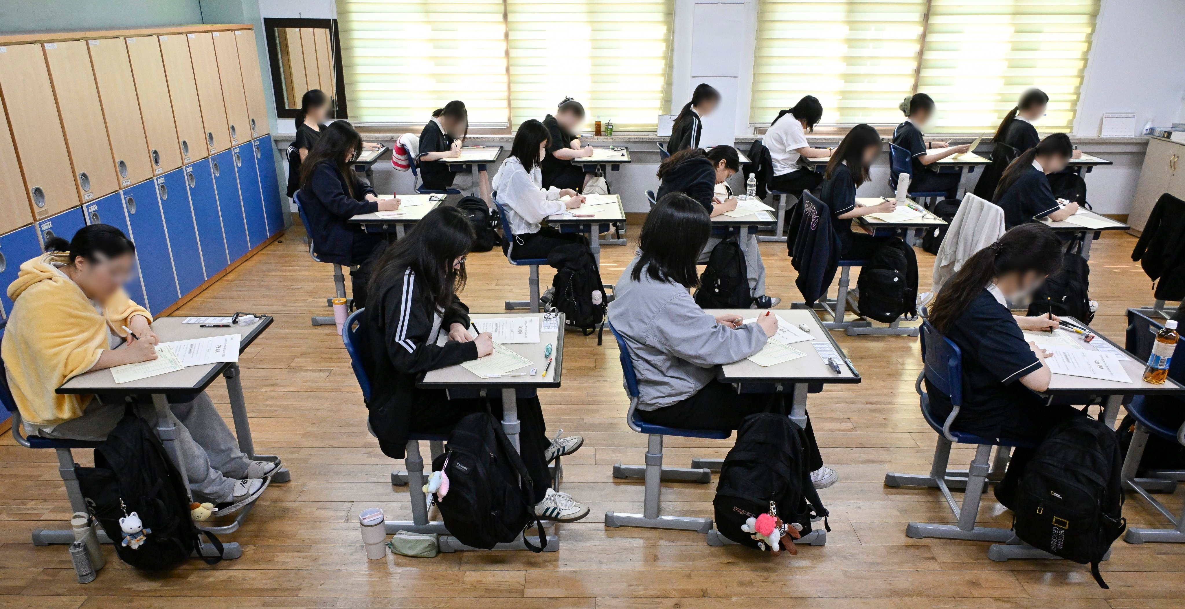 Seniors sit for a nationwide mock test at a high school in Seoul. South Korea’s education system is known for the high pressure faced by its students. Photo: EPA-EFE