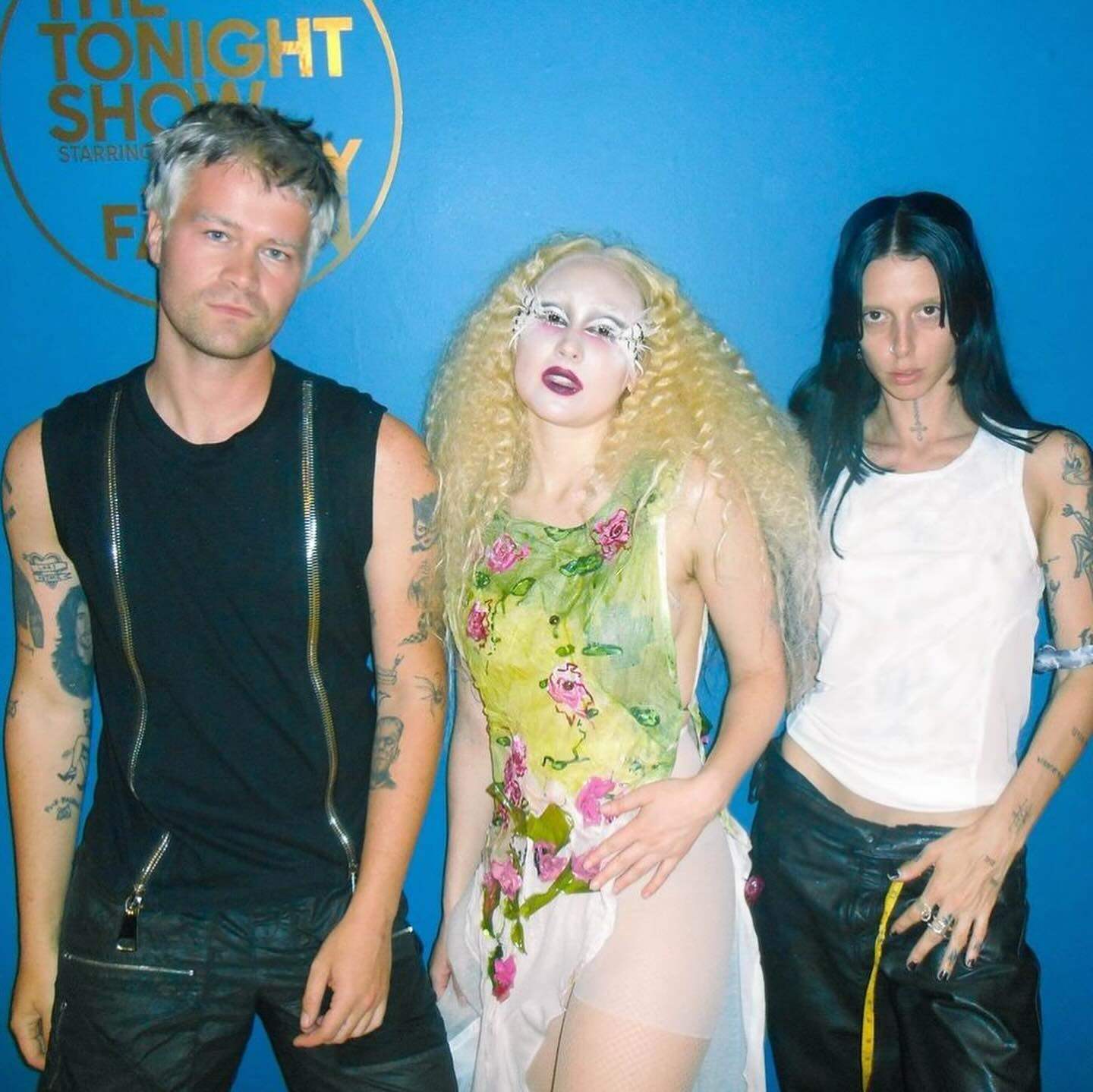 Chappell Roan (centre) wears a bio hand-painted garden dress with appliqués by Caroline Zimbalist on The Tonight Show in 2024. Photo: Instagram/carolinezimbalist