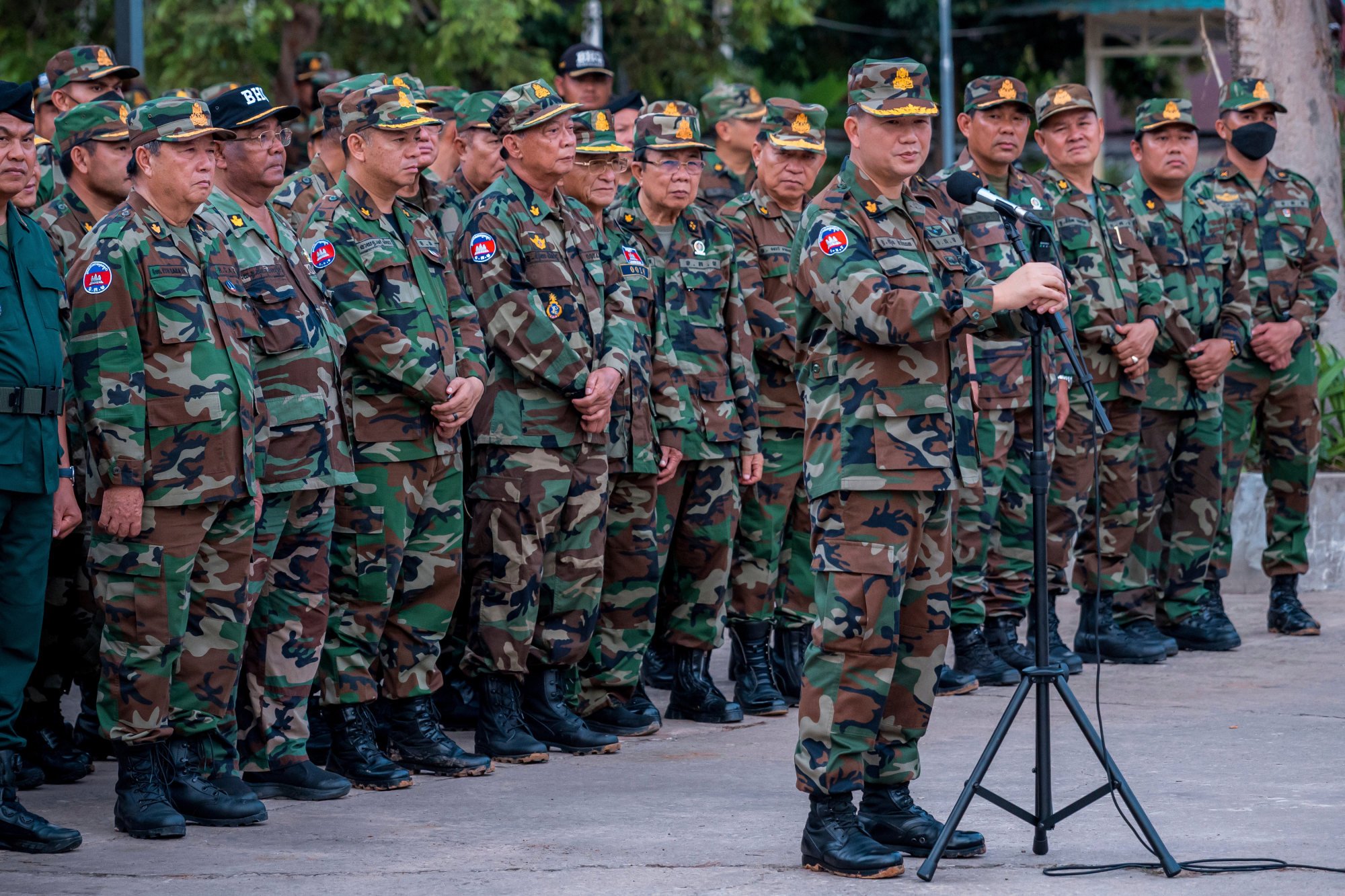 Hun Manet (foreground) delivers a speech in front of Cambodian troops during a visit to Preah Vihear, near the Cambodia-Thailand border, on June 23. Photo: Agence Kampuchea Press /AP Hun Manet (foreground) delivers a speech in front of Cambodian troops during a visit to Preah Vihear, near the Cambodia-Thailand border, on June 23. Photo: Agence Kampuchea Press /AP
