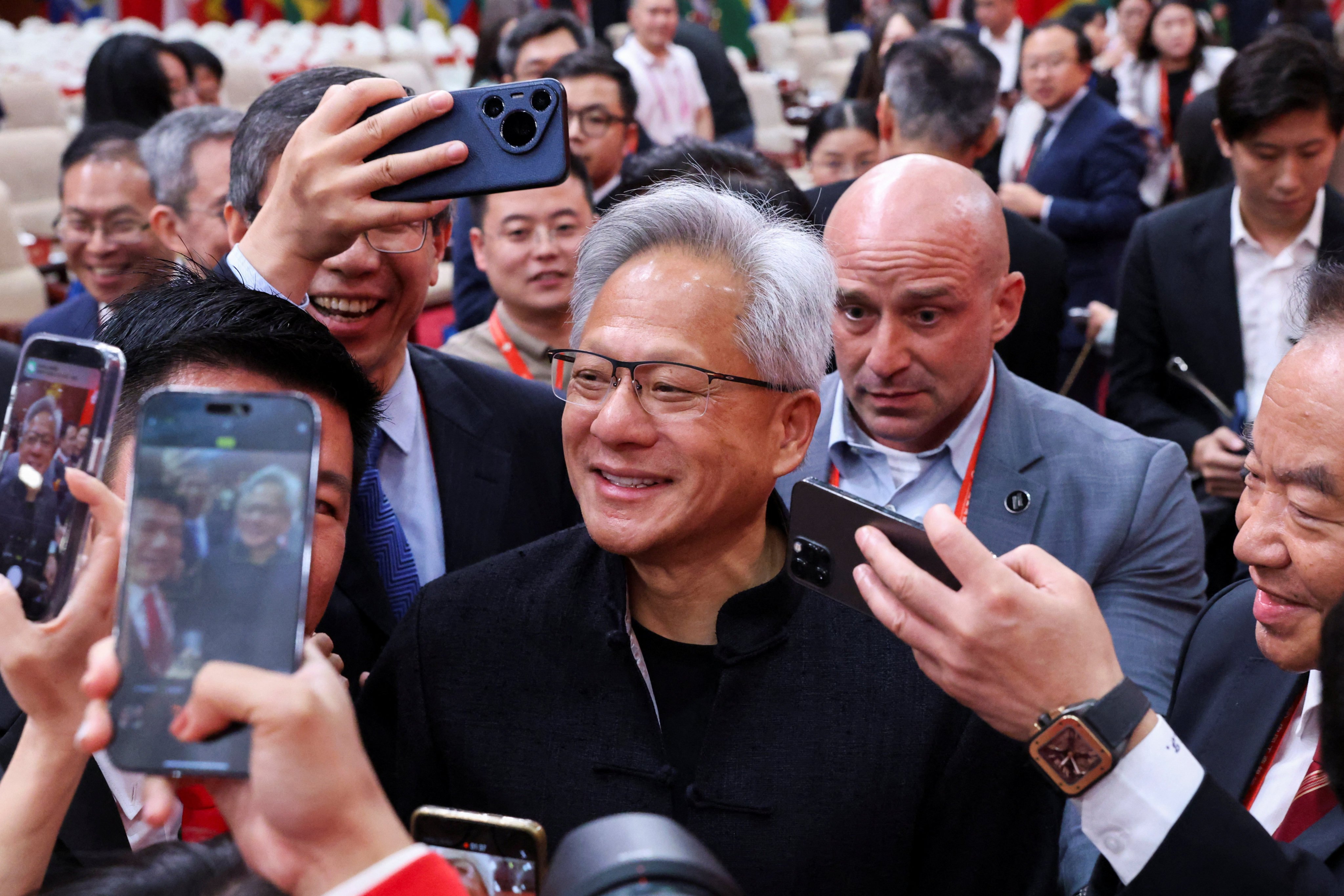 Nvidia CEO Jensen Huang is surrounded by reporters after the opening ceremony ofthe China International Supply Chain Expo in Beijing on Wednesday. Photo: Reuters
