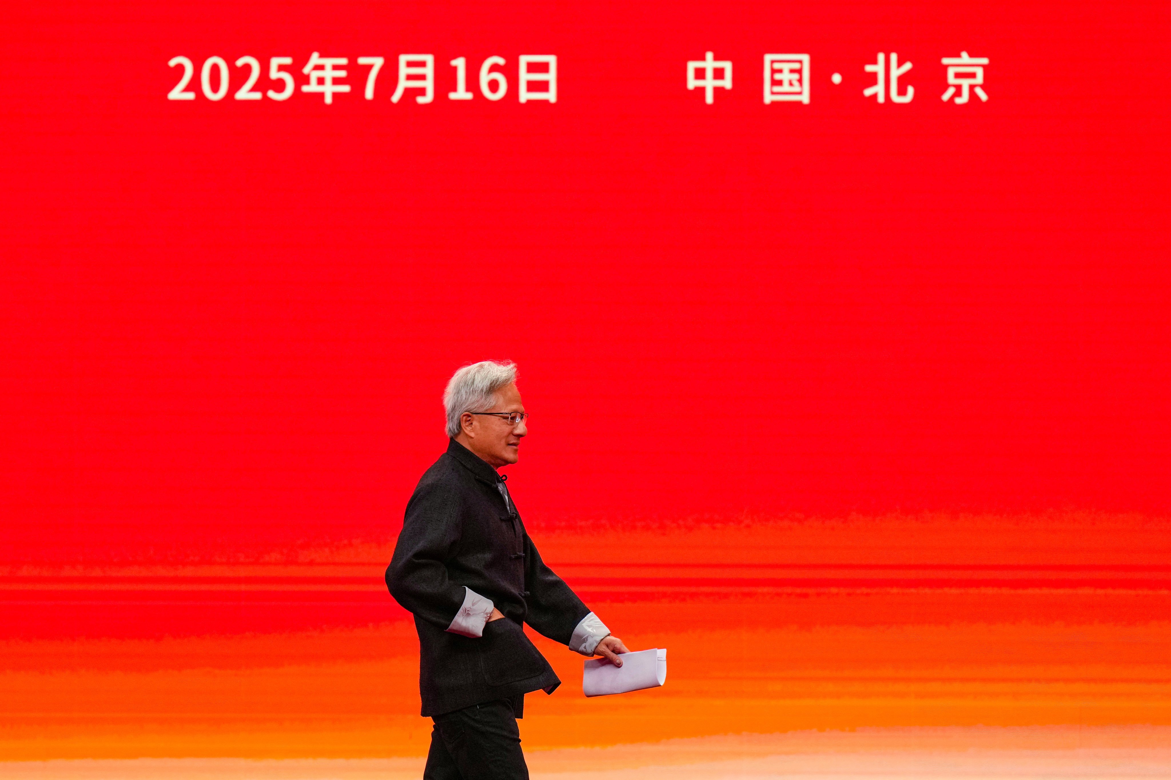 President and CEO of Nvidia Corporation Jensen Huang heads to deliver his speech for the opening ceremony of the 3rd China International Supply Chain Expo in Beijing on July 16, 2025. Photo: AP Photo