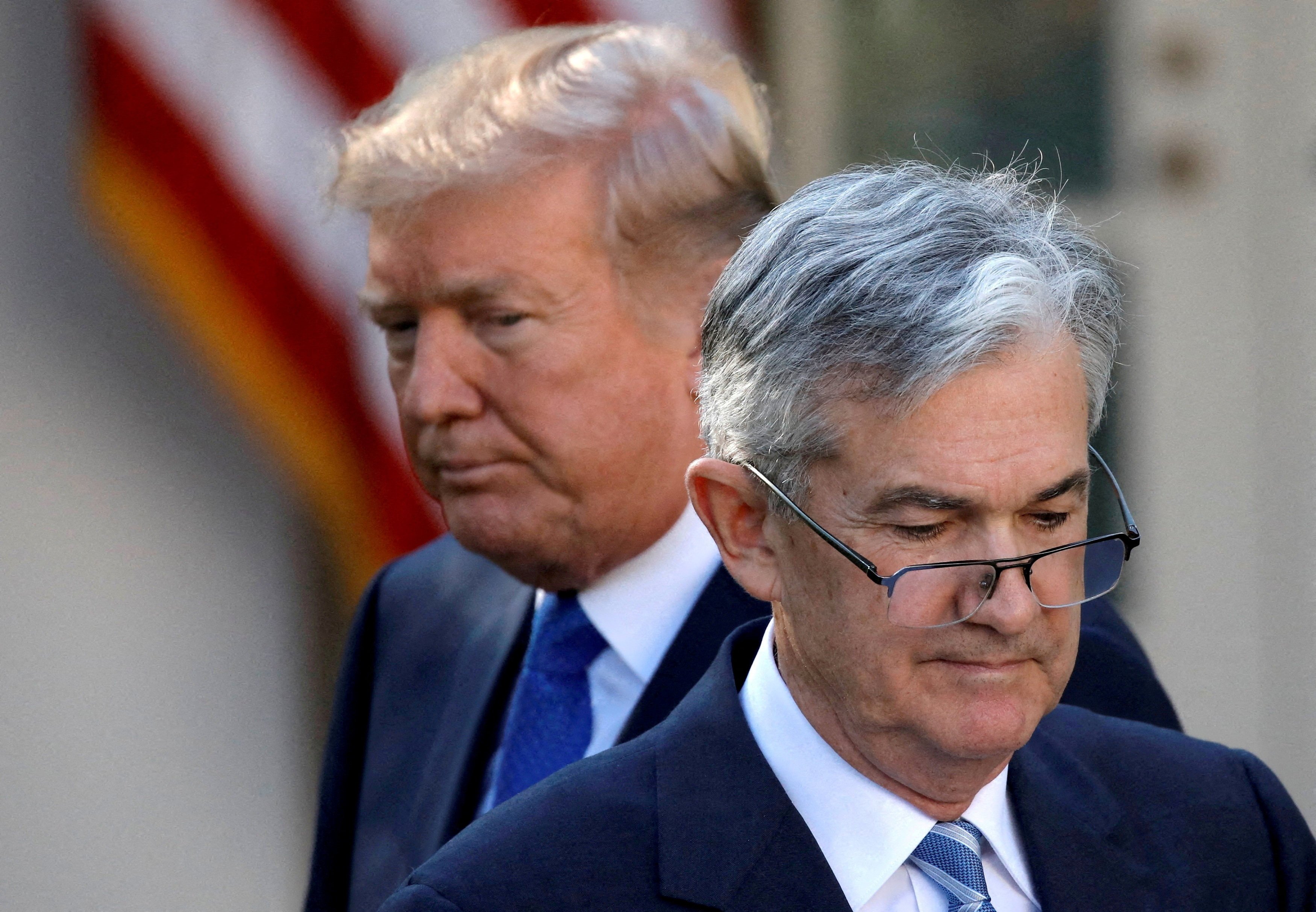US President Donald Trump looks on as Jerome Powell moves to the podium at the White House in November 2017. Photo: Reuters