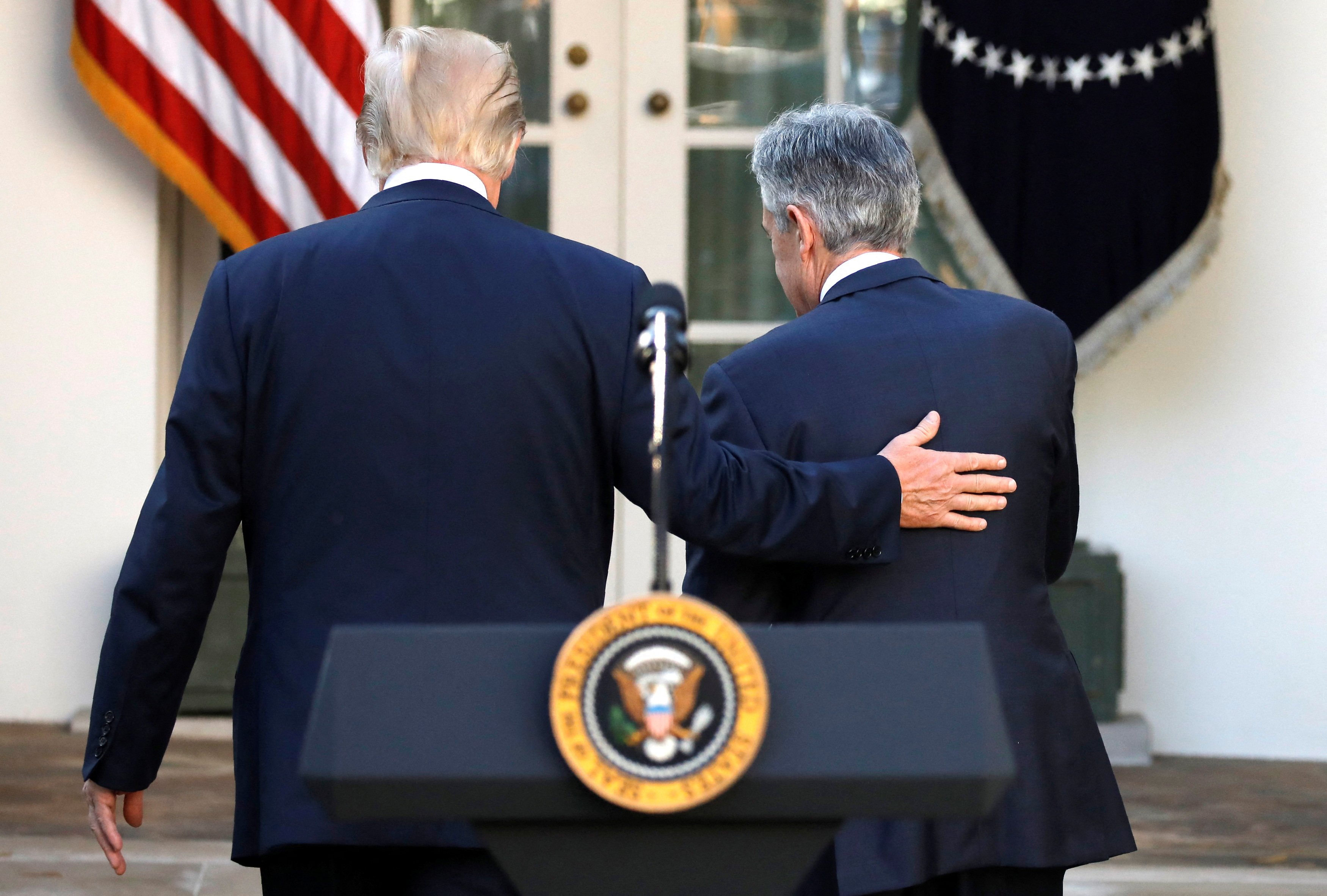 US President Donald Trump, left, leaves the Rose Garden with Jerome Powell, his nominee to become chairman of the US Federal Reserve, at the White House in Washington on November 2, 2017. Photo: Reuters