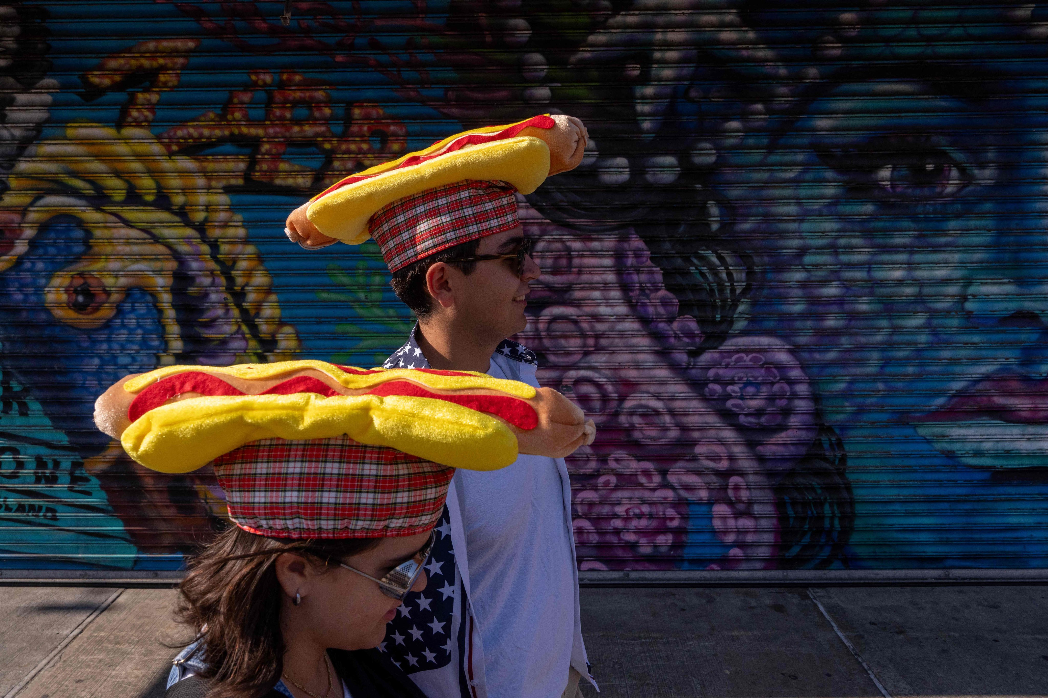 The Nathan’s Famous annual hot dog eating contest is a thrilling spectacle. Photo: AFP